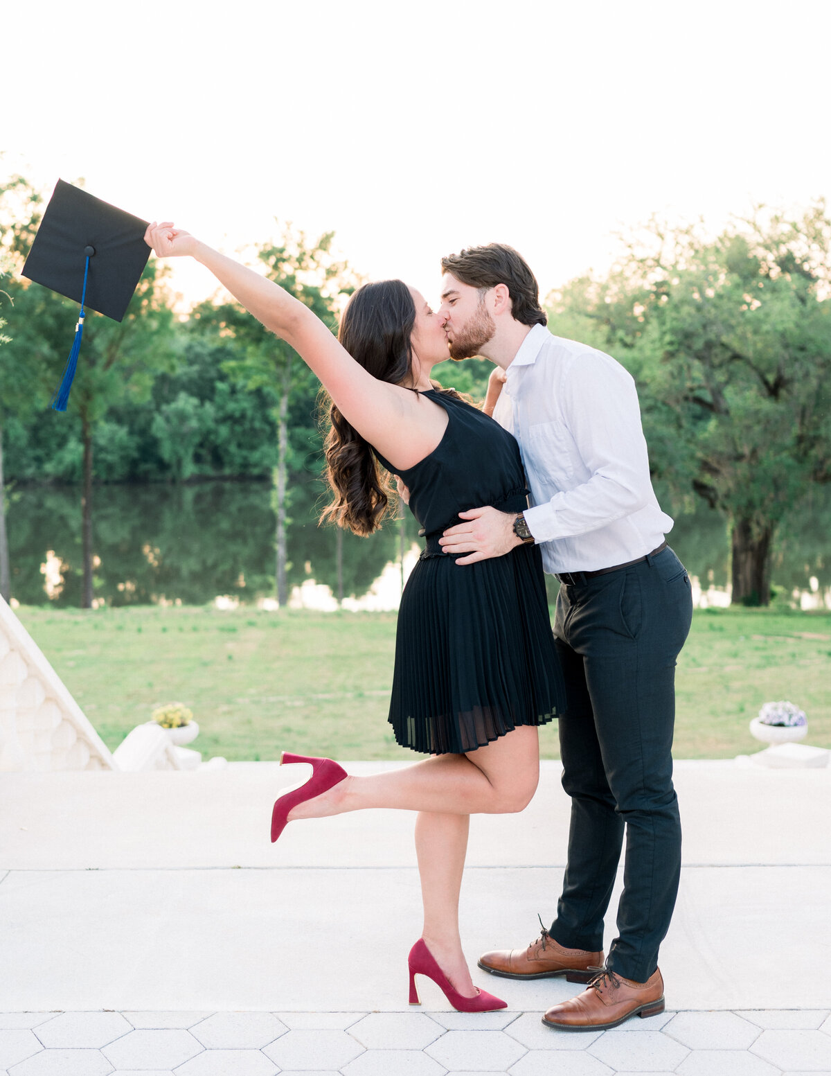 Happy couple celebrating her success graduating from college. Serving Bainbridge, GA, Tallahassee, FL & surrounding areas.