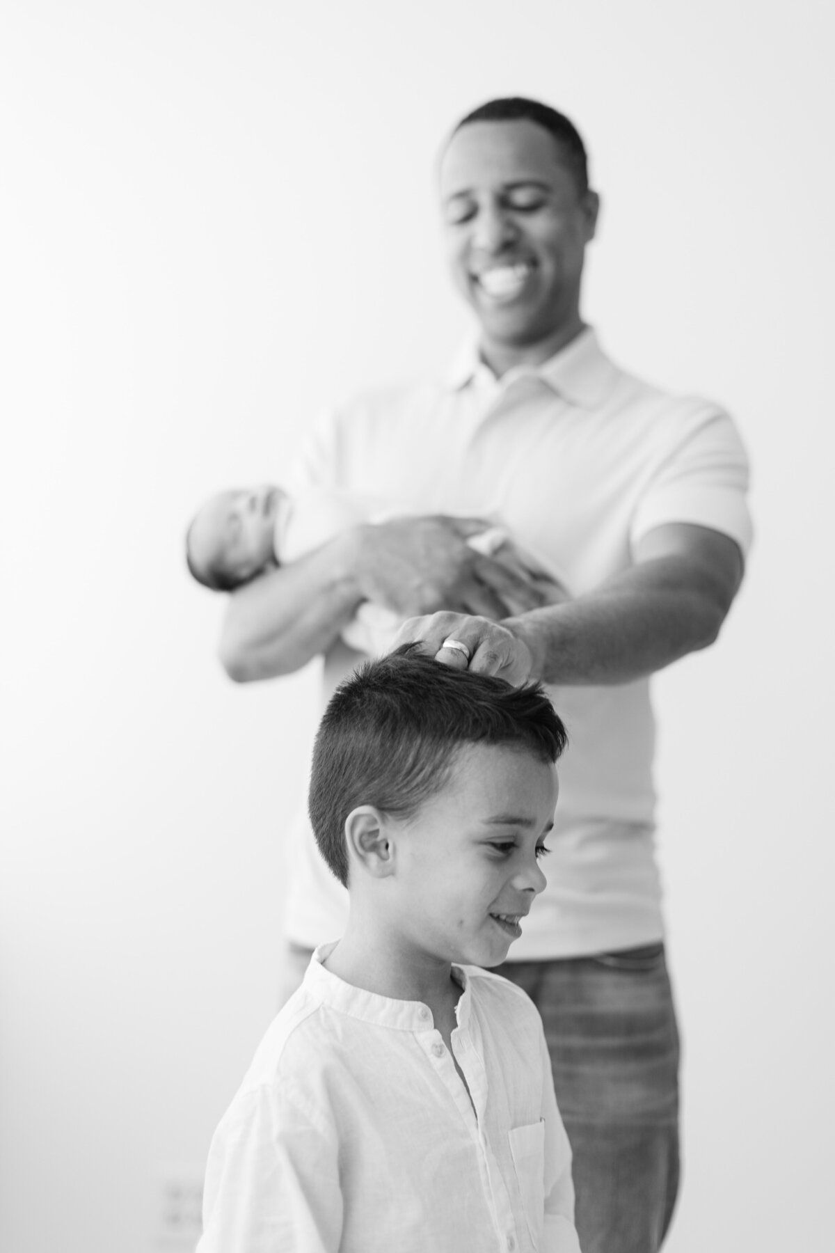 Newborn photography session with siblings at a Philadelphia photography studio - 22