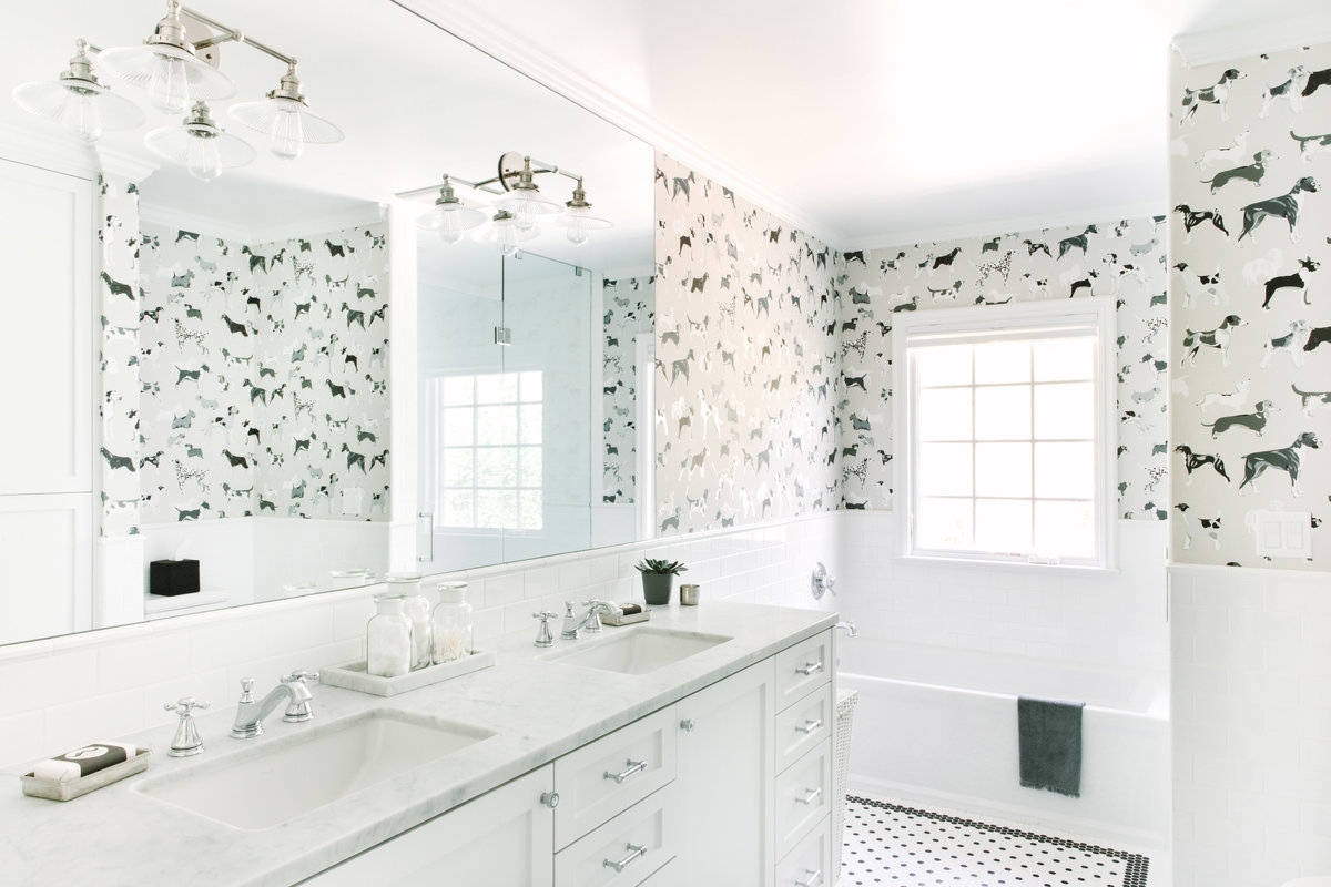 Black and white boys bathroom with subway tile and black and white hexagon tile