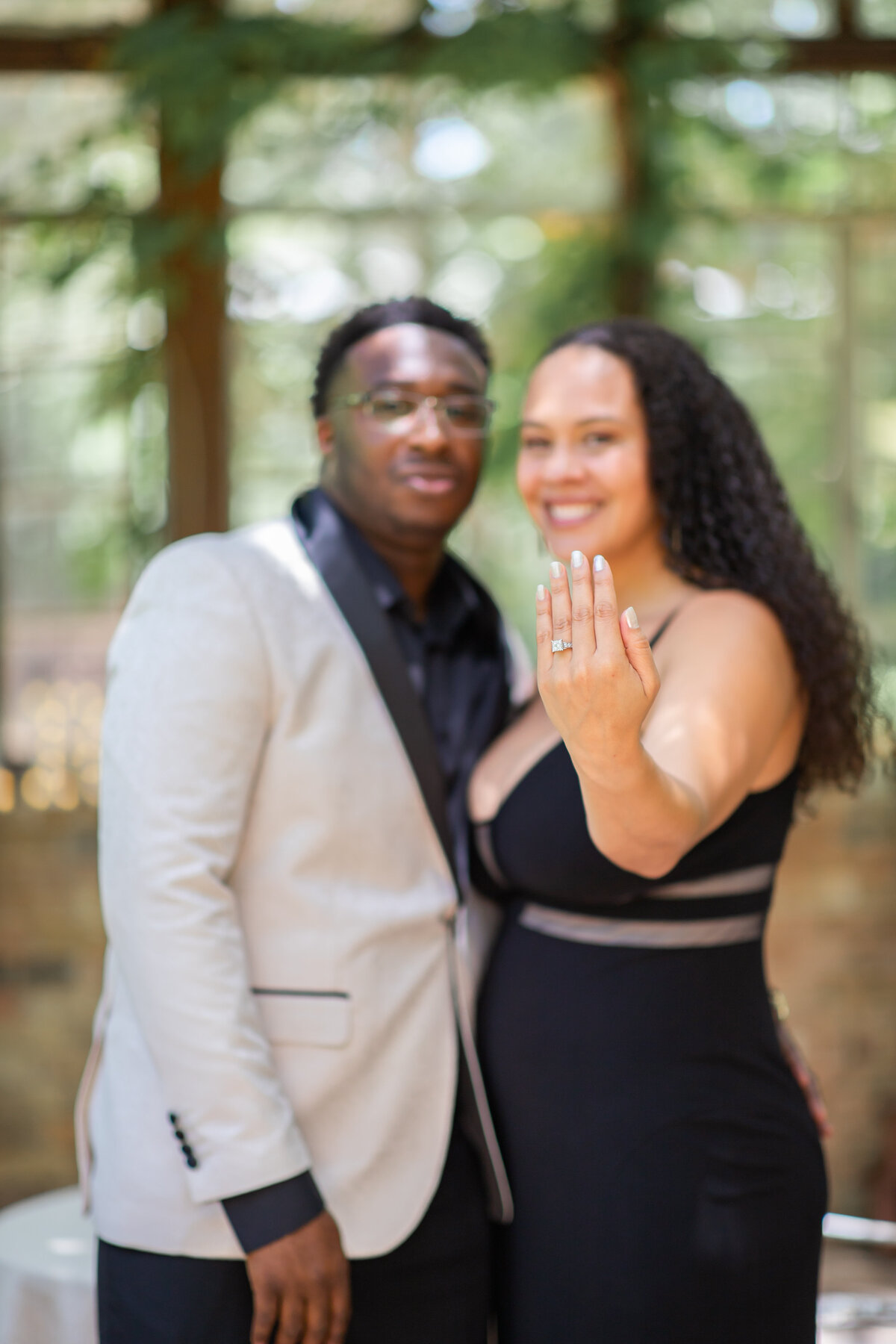 How to plan a proposal in Austin couple woman showing off engagement ring