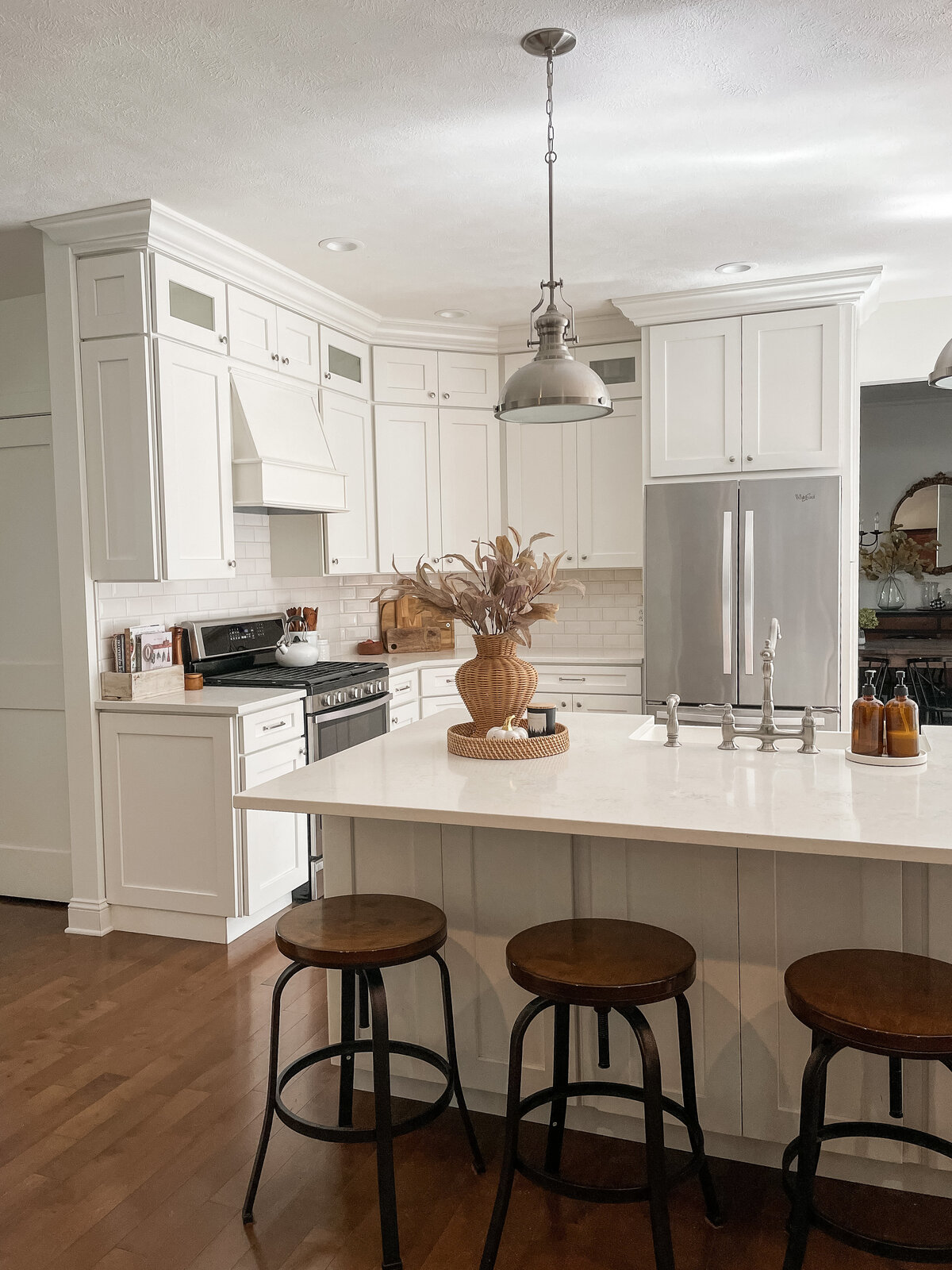 Large industrial pendant over quartz island