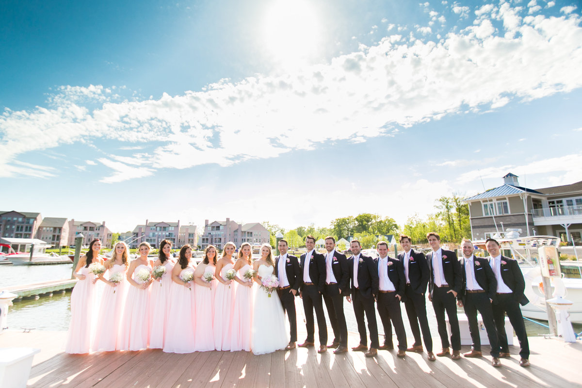 Ocean Pines Yacht Club Wedding Bridesmaids in Pink Dresses on the docks