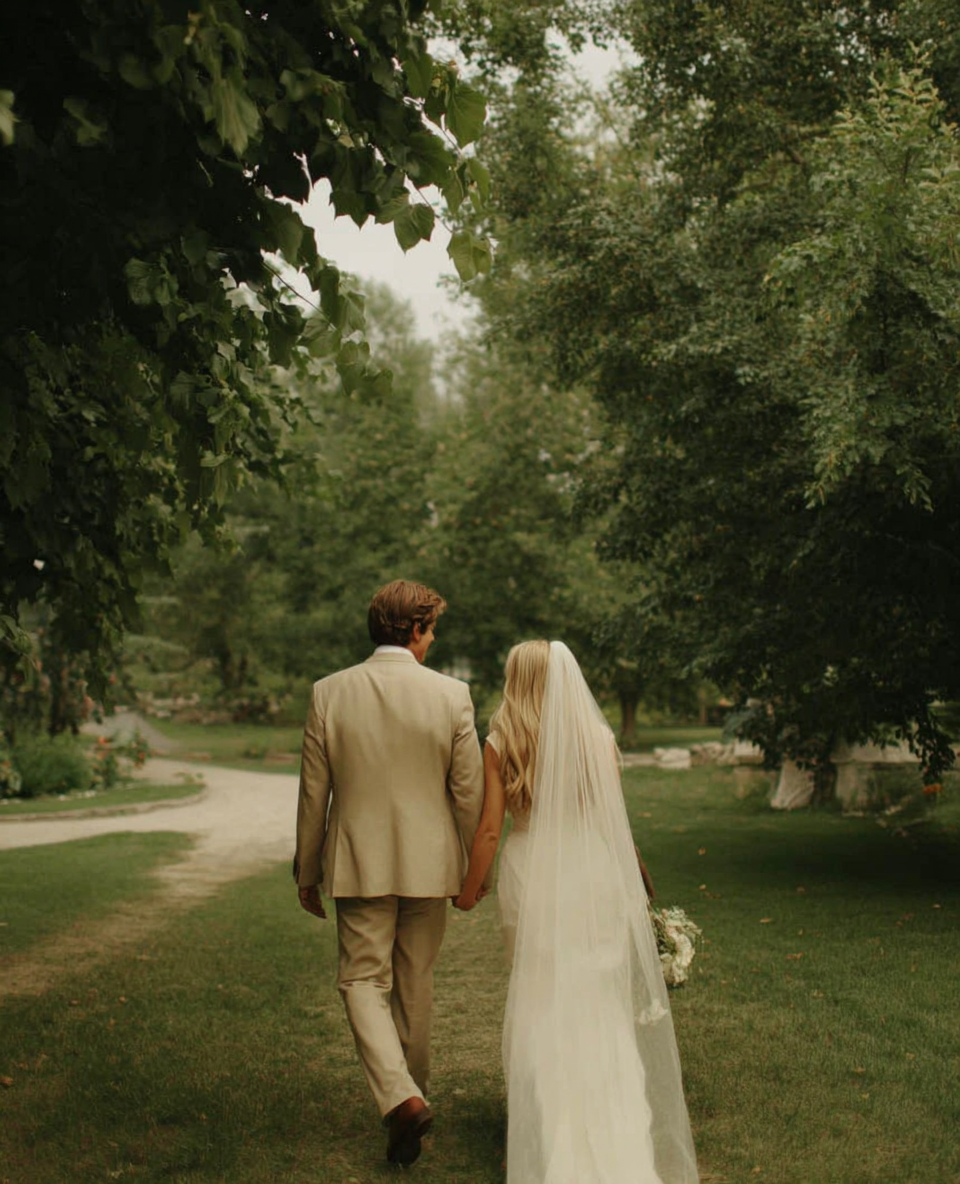 u8487914977_a_bride_and_groom_walking_in_the_park_wearing_a_b_5b260566-7452-495a-b538-7771a7c98d86_2