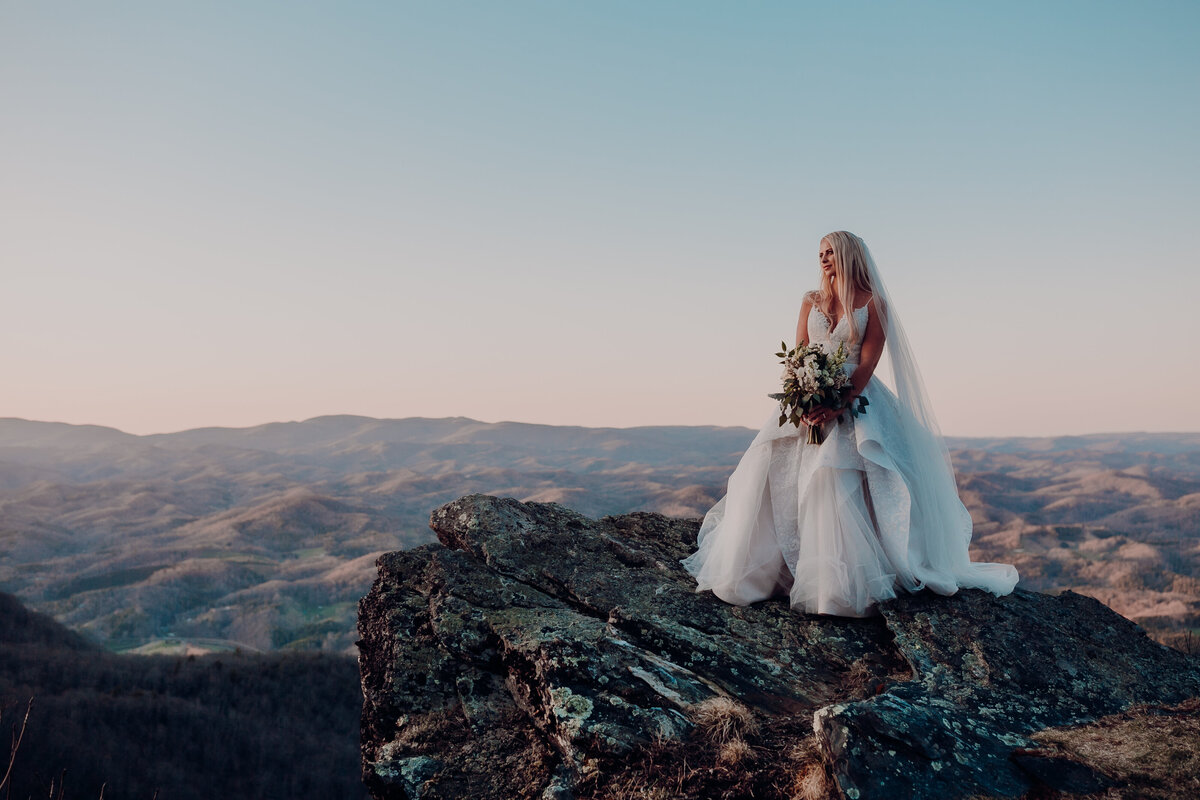 Photo + Video team in North Carolina mountains wedding during golden hour portraits  for elopement. 