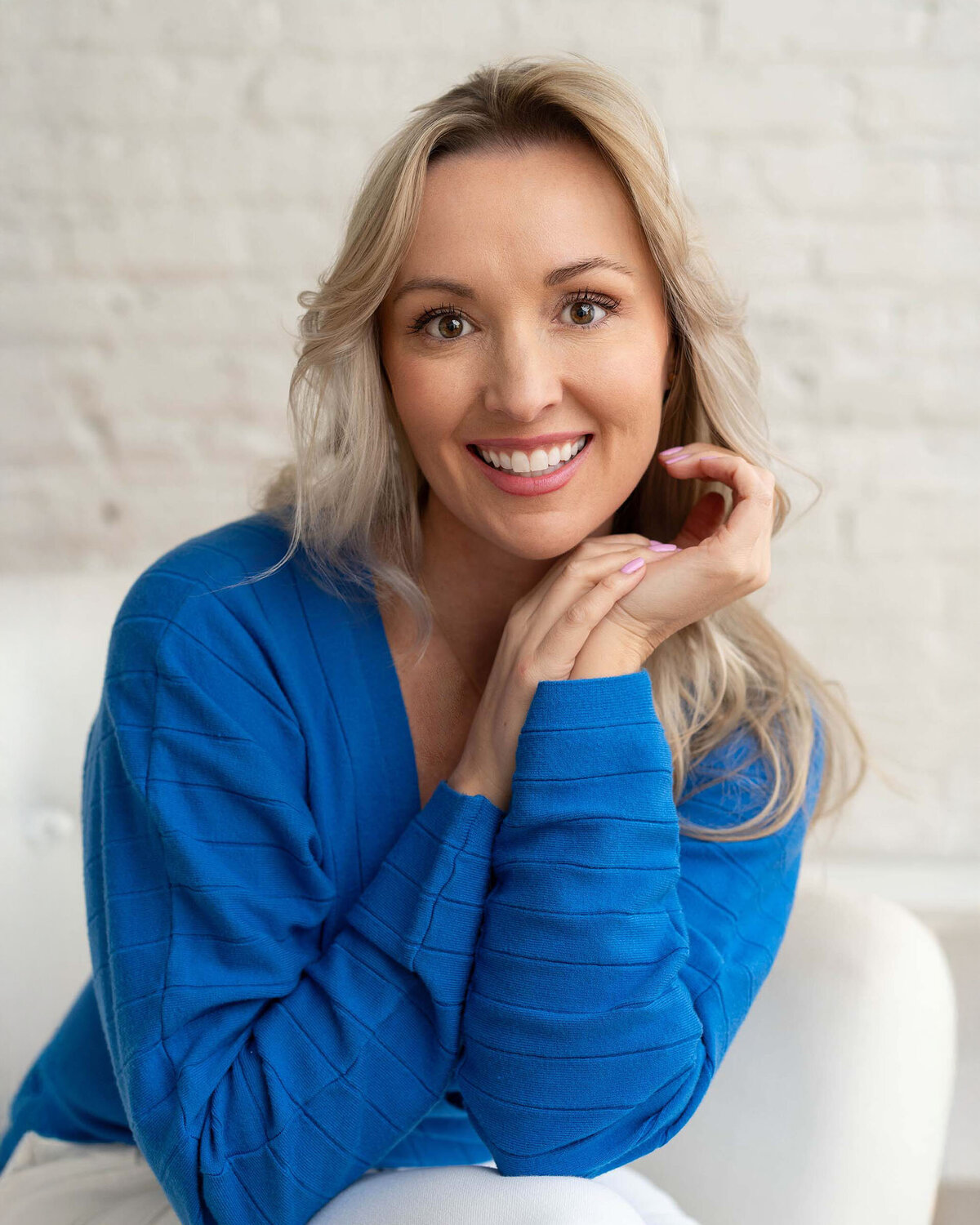 womans-headshot-in-bright-blue-shirt