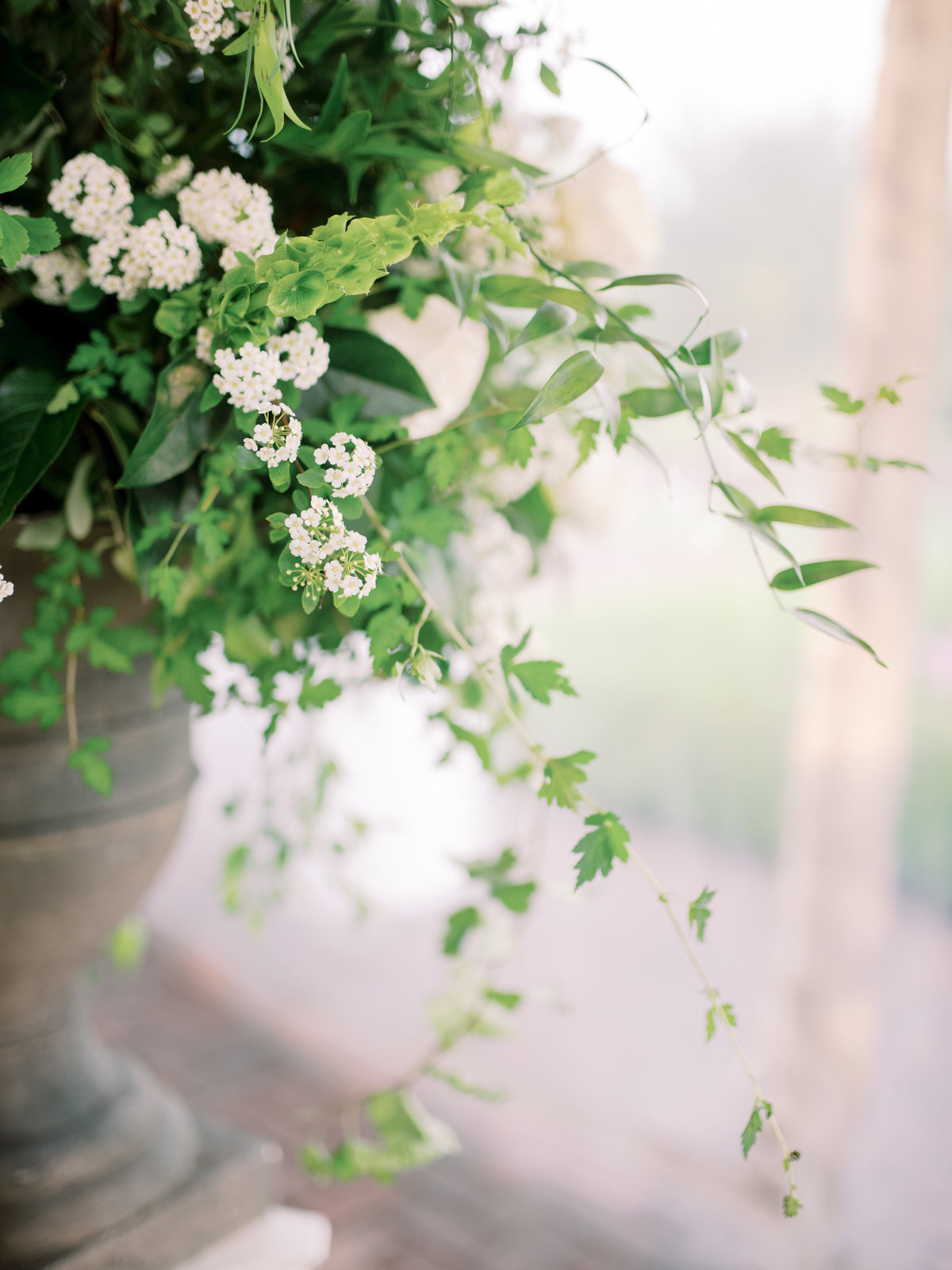 close up of white wedding ceremony arrangements