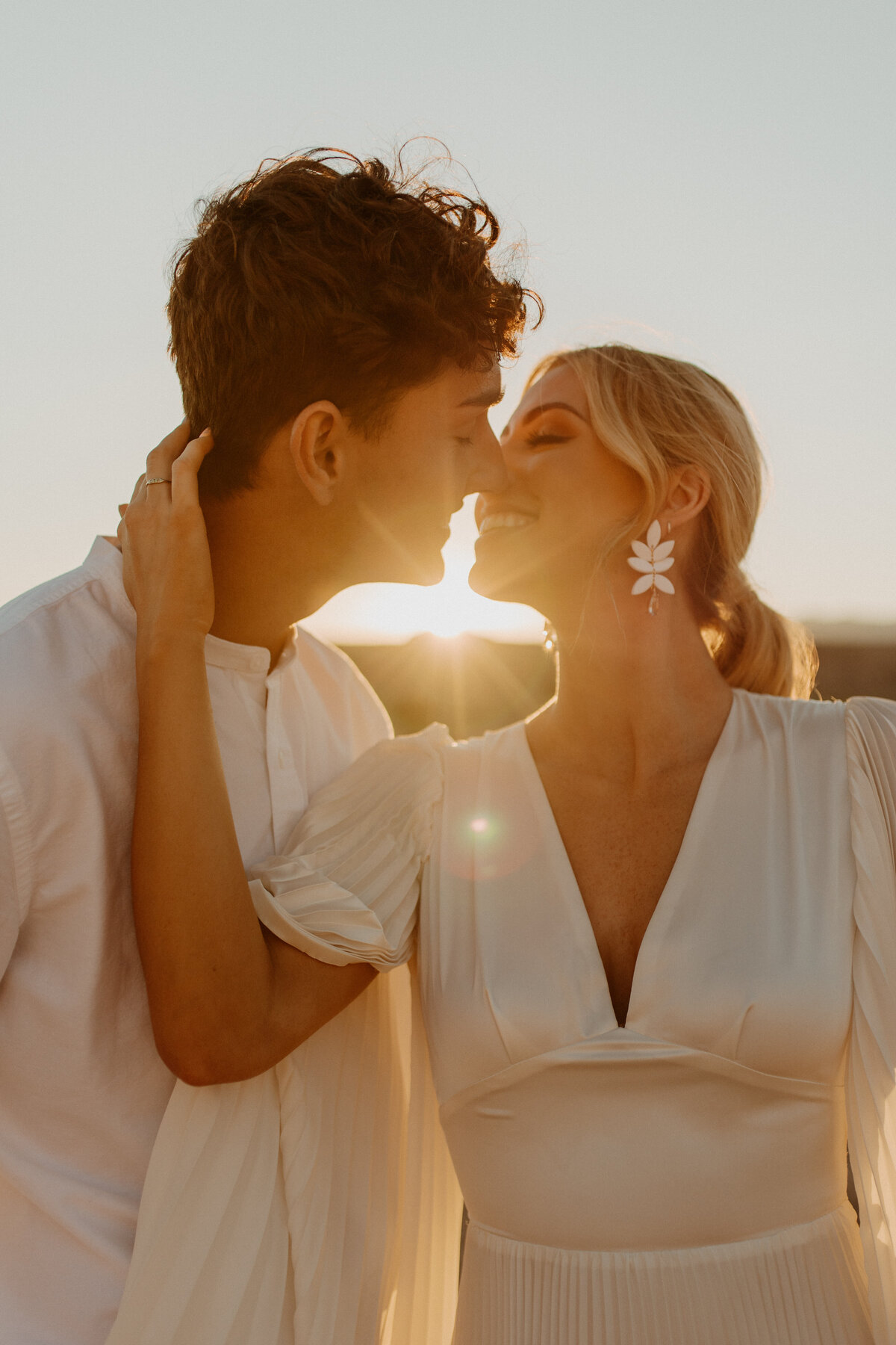 wisconsin wedding photographer mariah jones photography desert elopement sunset white dress