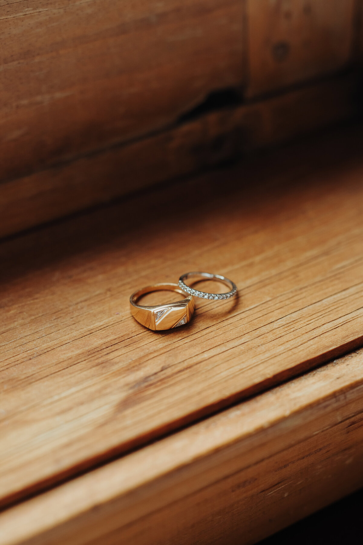 Close-up shot of a couple's wedding rings before the wedding proceeds