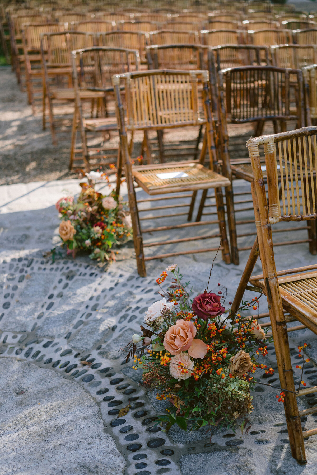 Organic aisle markers for a fall wedding ceremony. Wedding at Bride’s childhood home. Whimsical and organic floral design for autumnal wedding in colors of copper, yellow, blush, cream, and pops of orange. Clear tented wedding outside Nashville, TN. Design by Rosemary & Finch Floral Design in Nashville, TN.