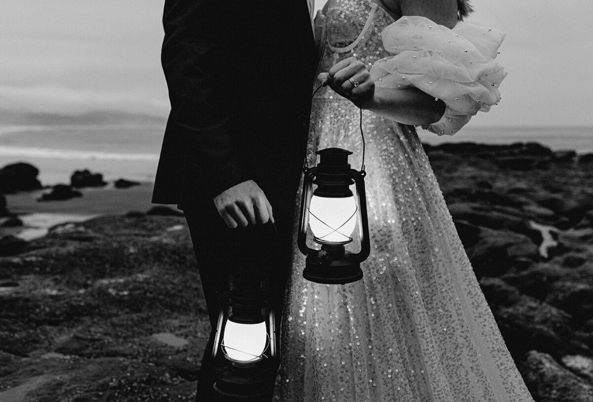 Married couple holding a light lantern