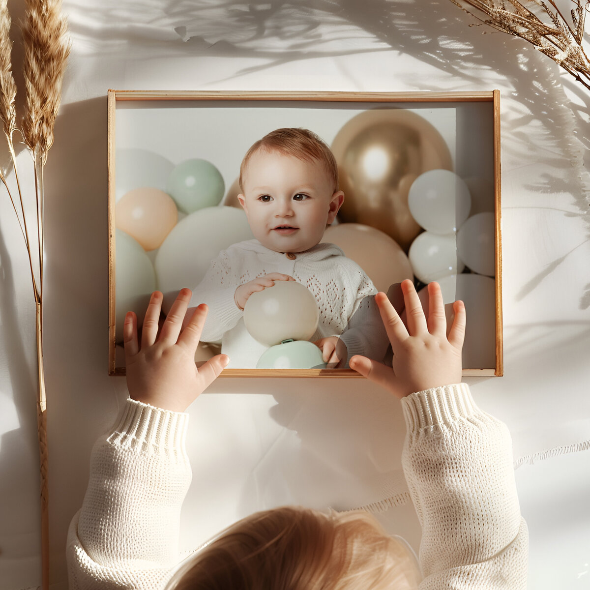 Syracuse photographer, 1st birthday, cake smash, baby, props, birthday photoshoot, photography, backdrop, studio, white, balloons, cake, props, theme, hands, wall art