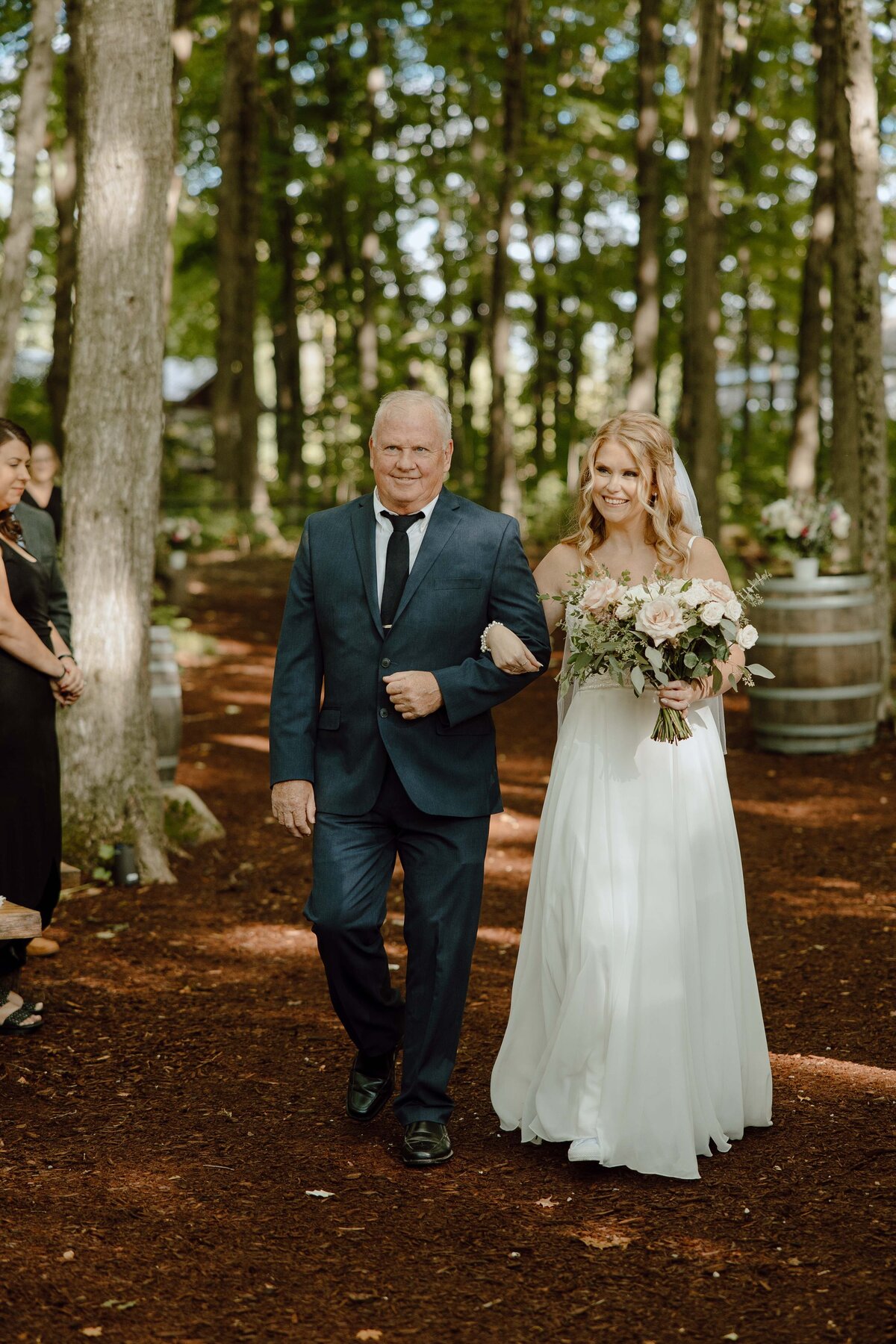 father of the bride walking down bride