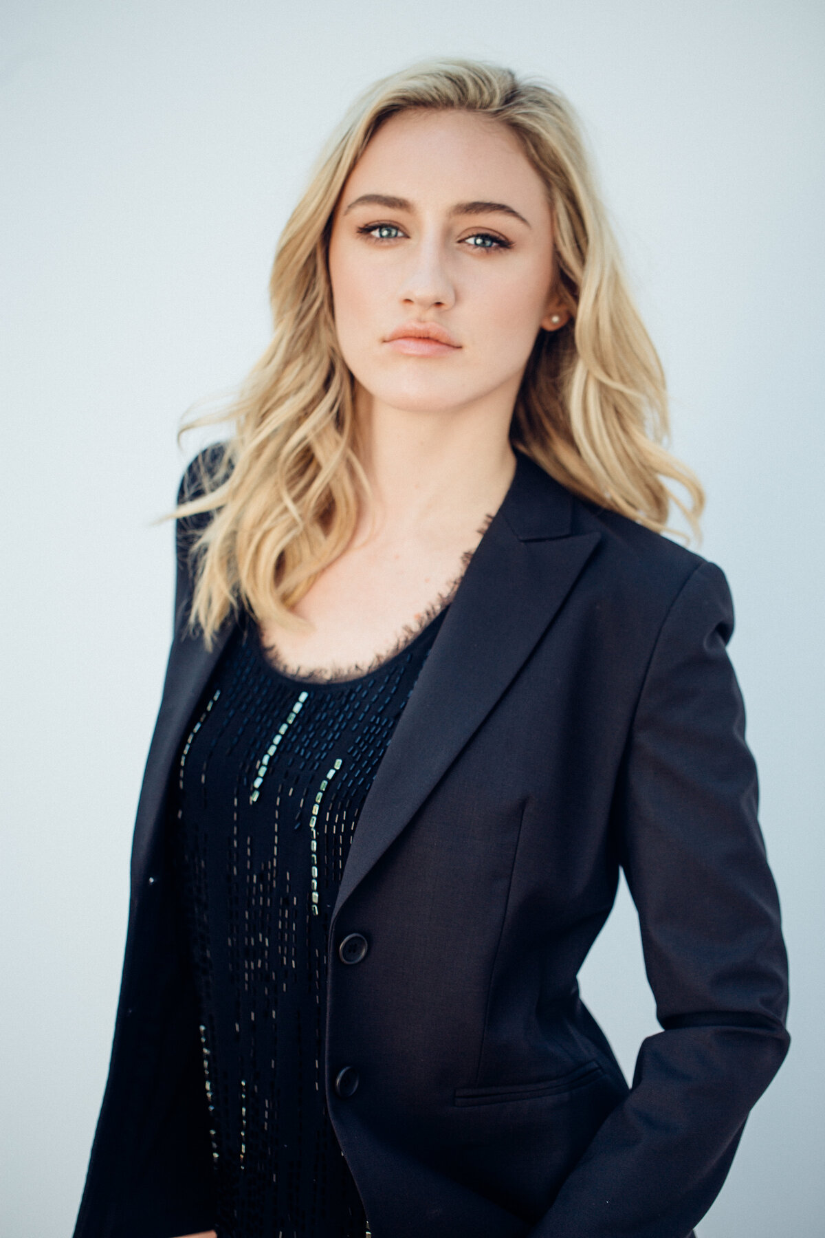 Headshot Photograph Of Young Woman In Outer Black Blazer And Inner Black Blouse Los Angeles