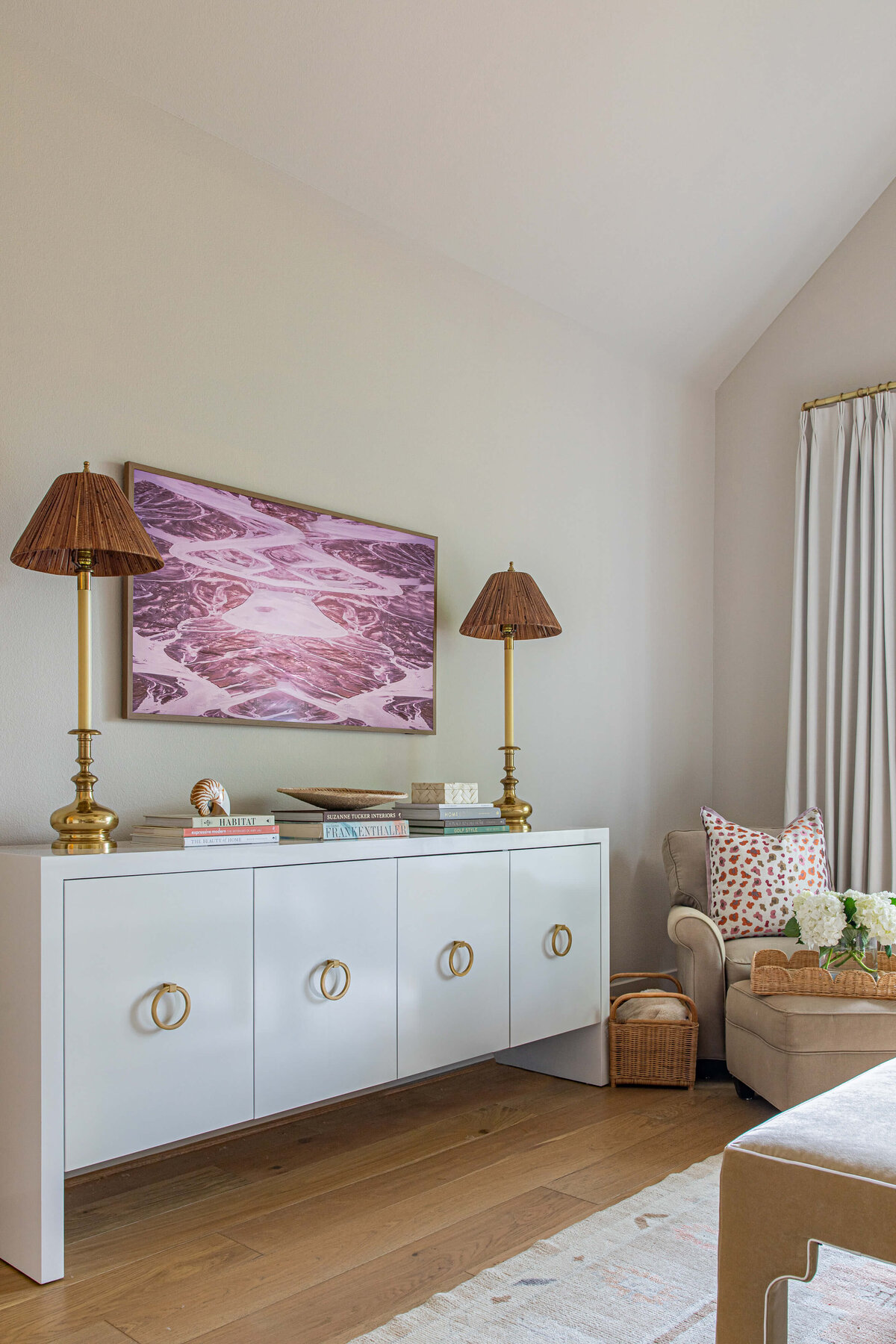 oyster creek studios aryns home minimalist storage and brown lamps with purple abstract artwork in bedroom