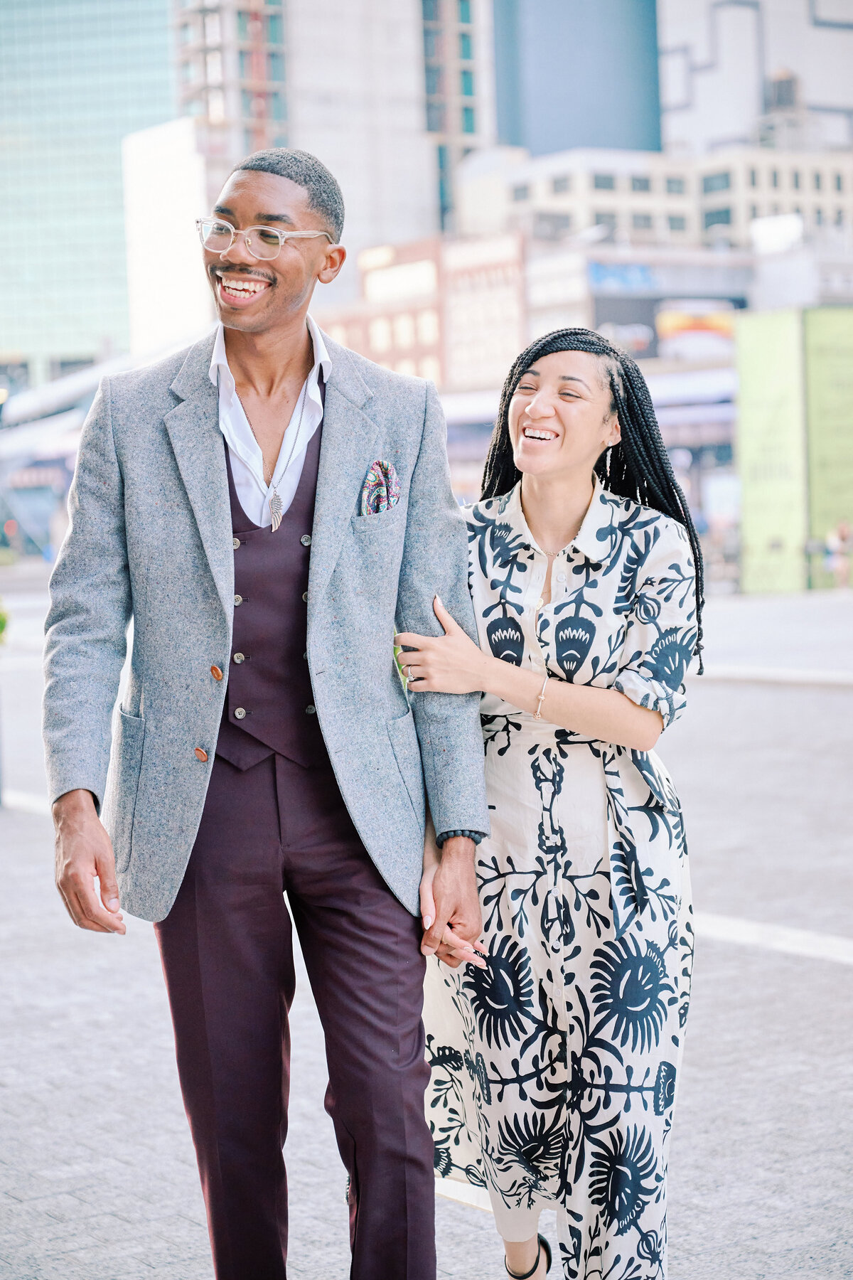 Couple walk together after proposal in South Street Seaport in New York City, New York City Proposal Photographer Corey Lamar Photography