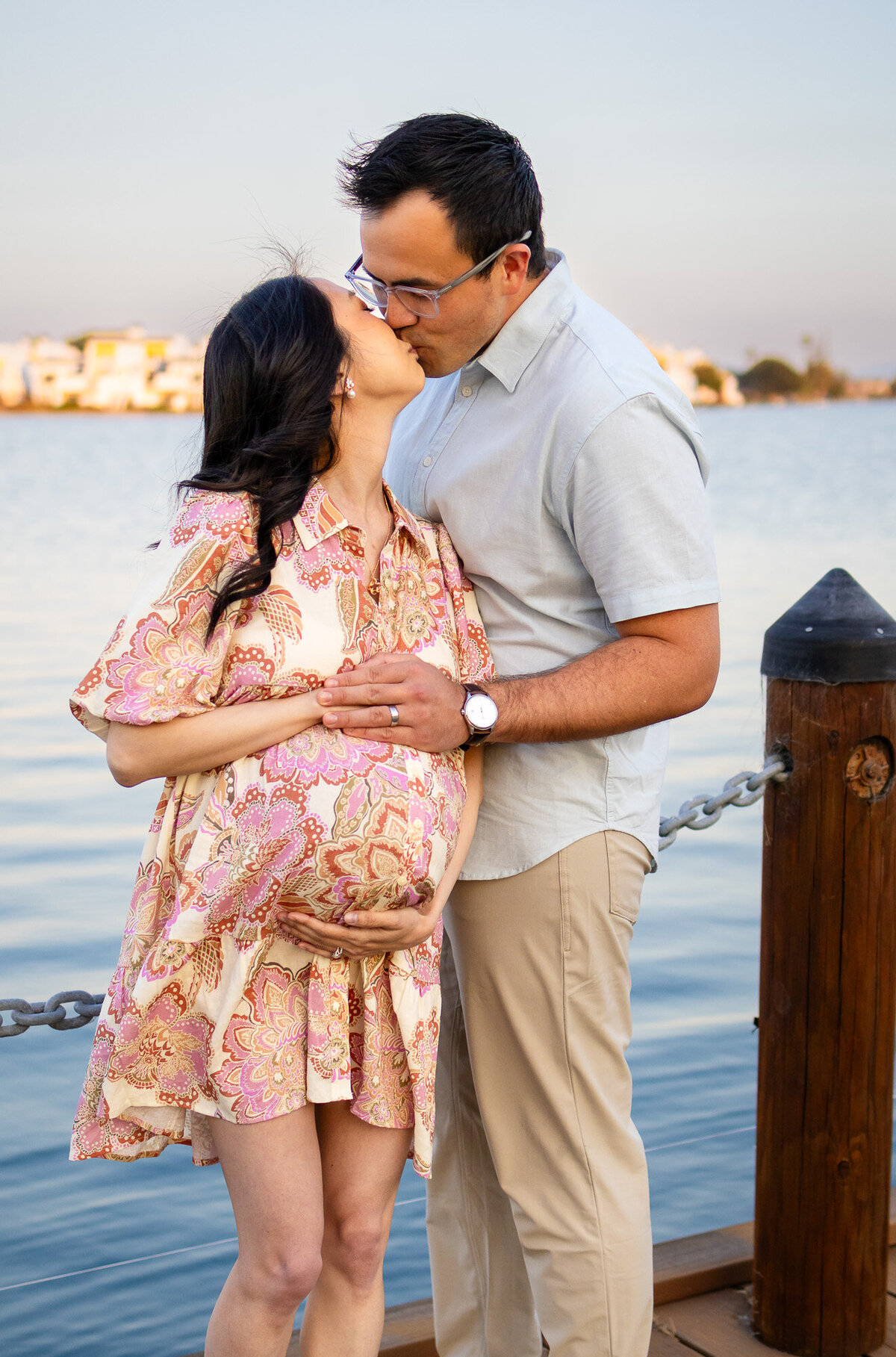 Pregnant couple gazing at each other joyfully by the water — Bay Area Maternity Portfolio - Ellobelle Photography