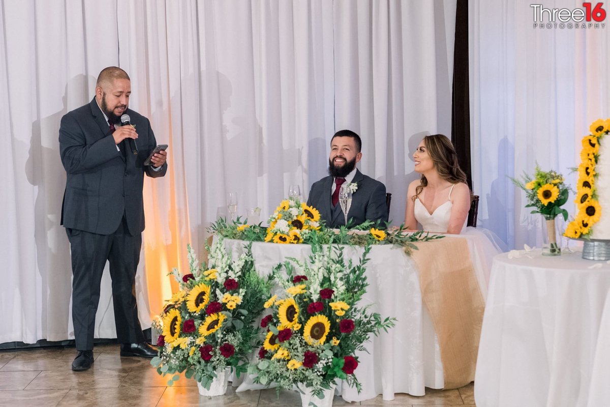 Best Man gives toast to the Bride and Groom during the reception