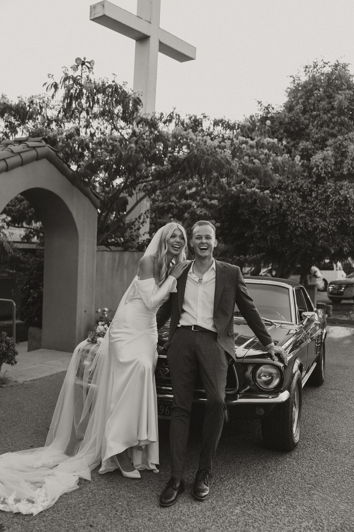 wedding photo on a car