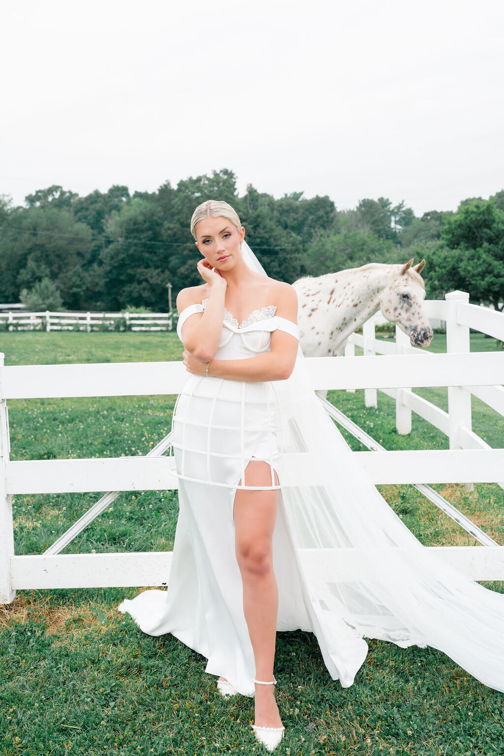Statement bridal dress with detachable crinoline and delicate lace veil
