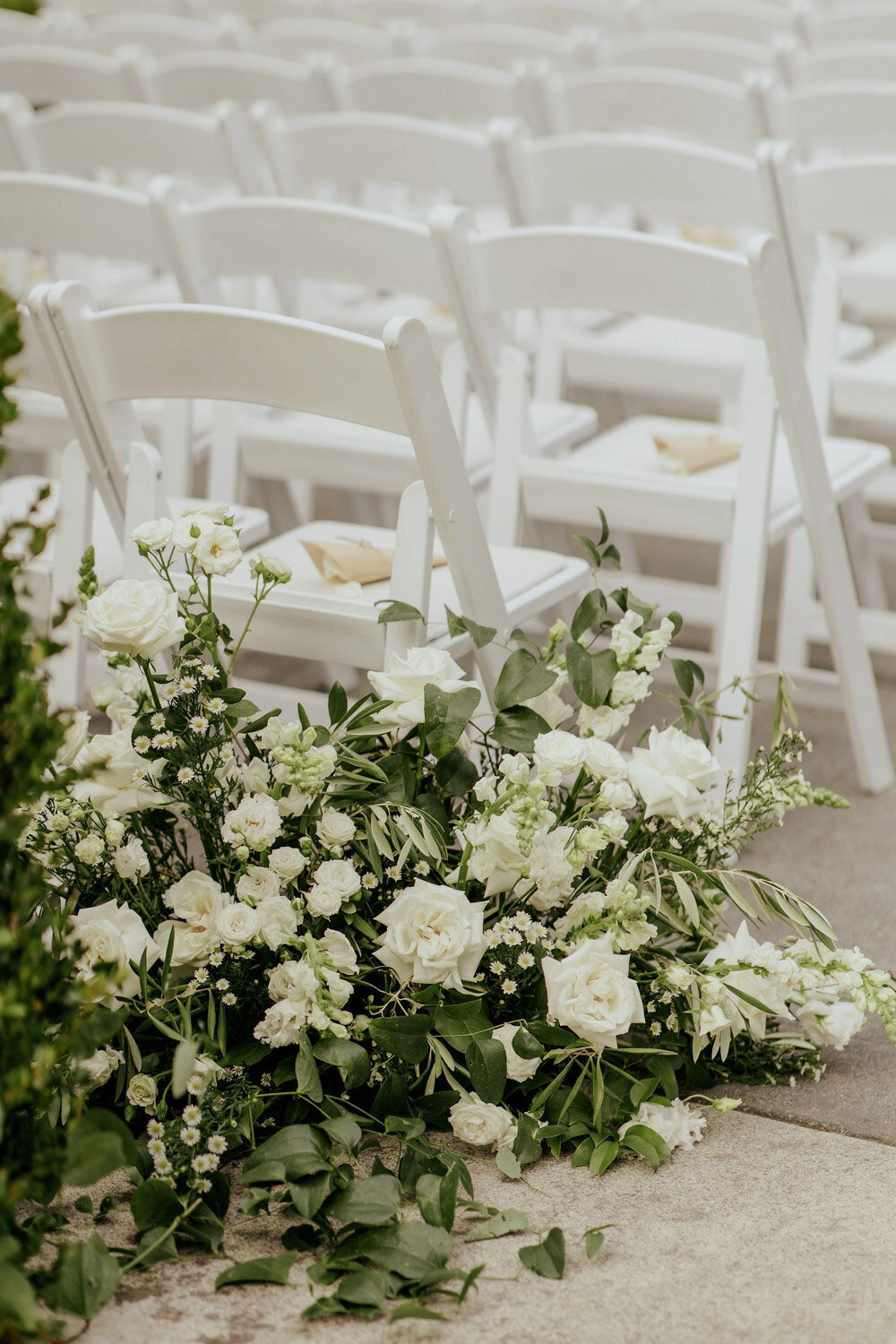Elegant wedding flower design for wedding aisle 