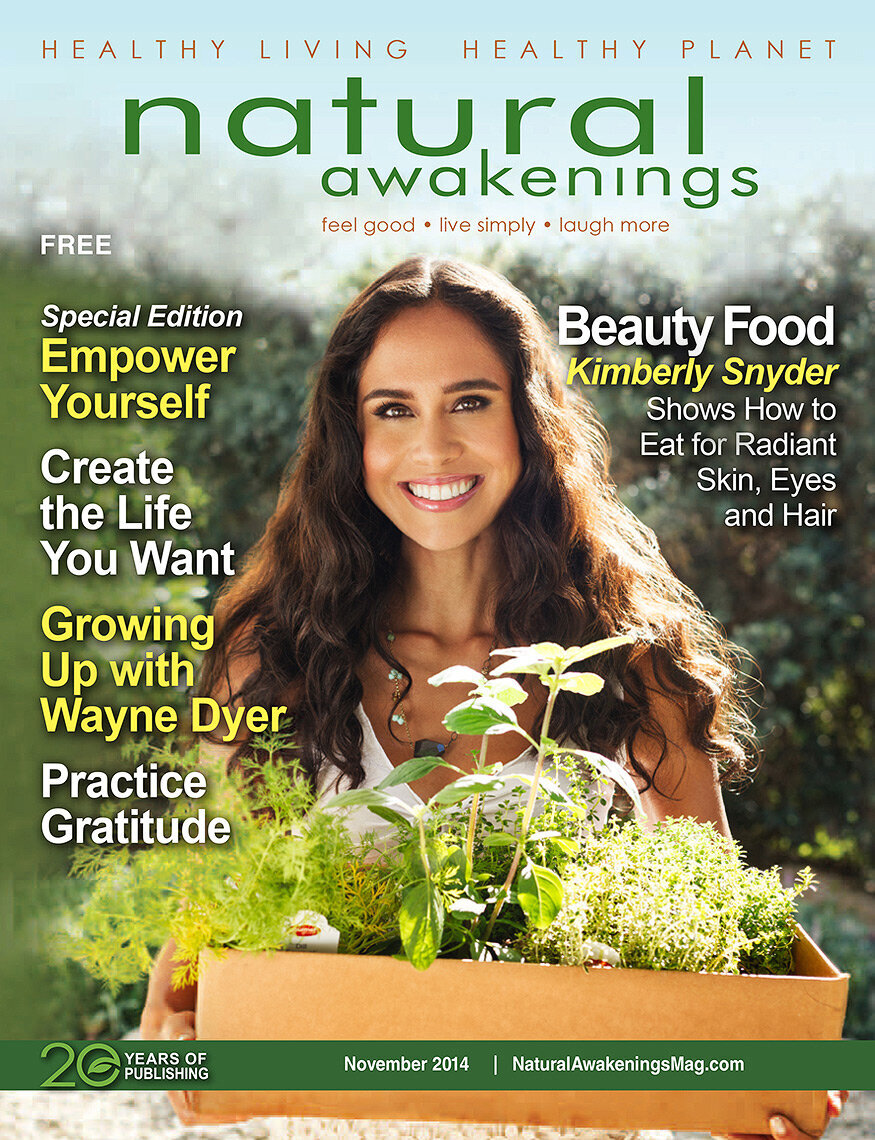 Cover for Natural Awakening magazine featuring a serene outdoor portrait of a model promoting holistic wellness.