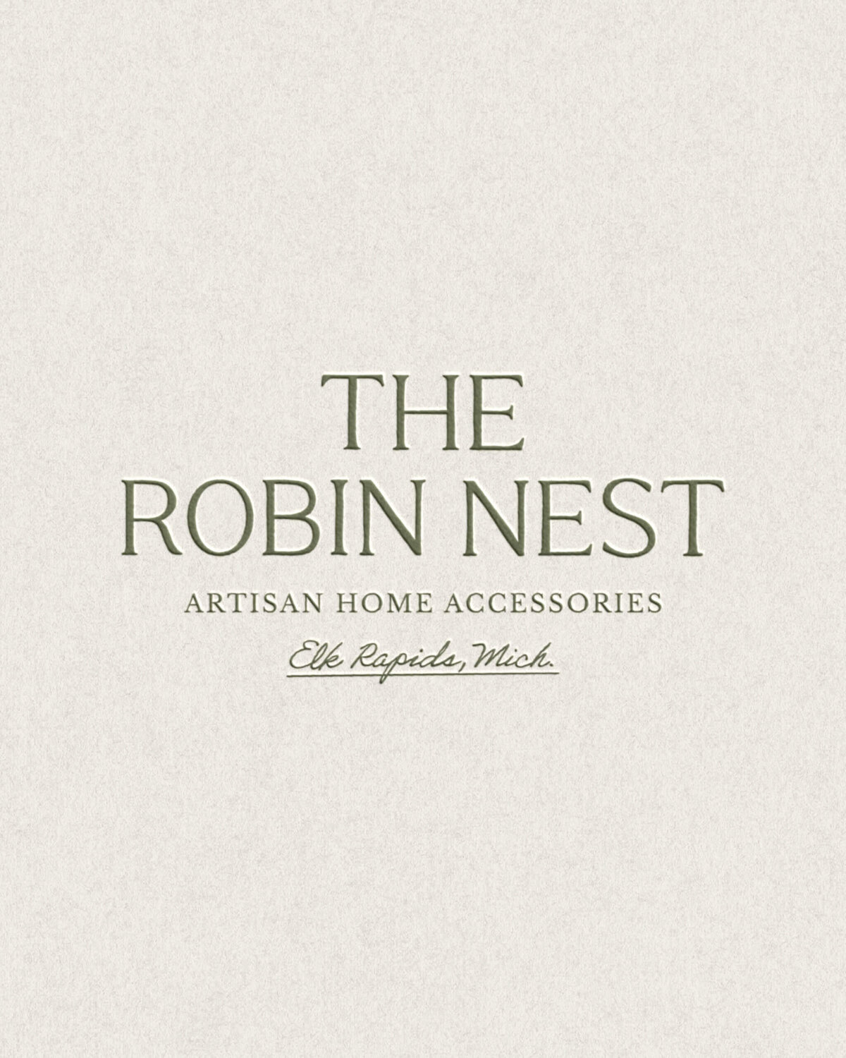 Elegant logo design for a handcrafted home goods brand, based in Michigan, using a classic serif font and soft neutral tones to evoke timeless warmth.