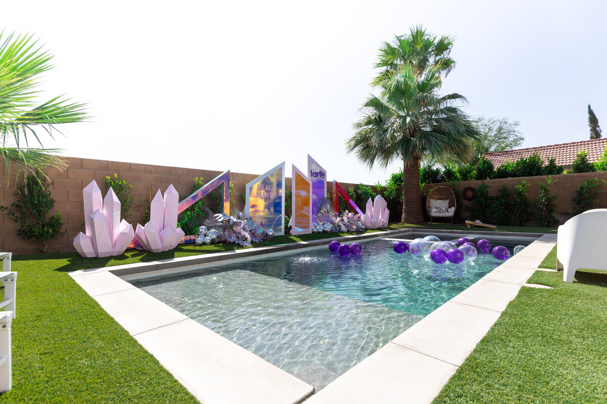 Tarte beauty activation by The Works Collective | custom poolside event installation in Palm Springs, California.
