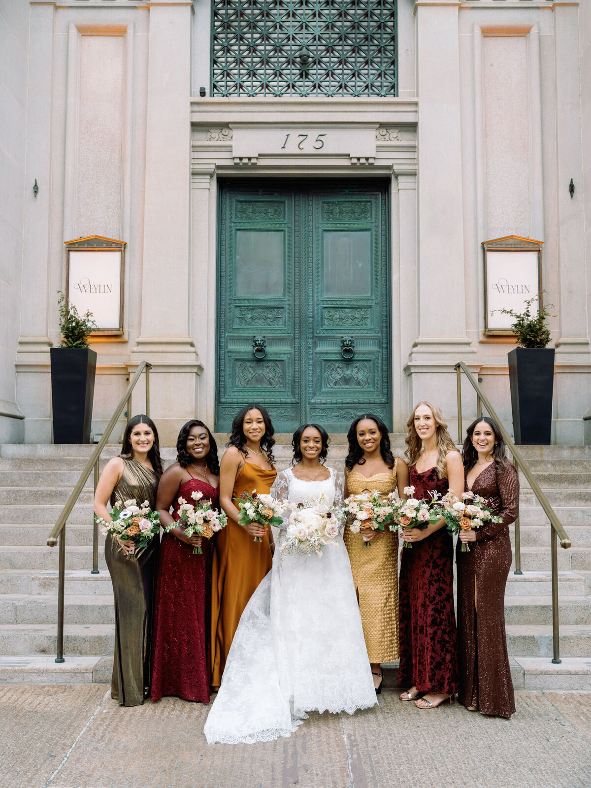 mismatched bridesmaids dresses at historic brooklyn wedding venue