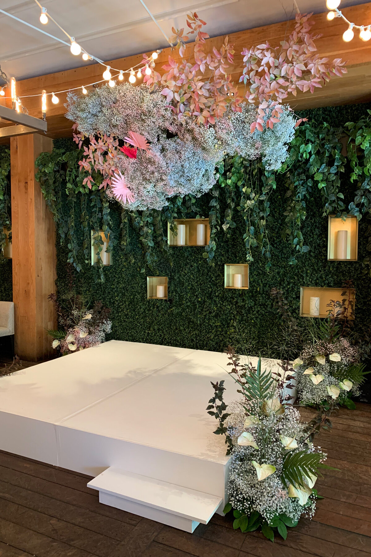 A suspended flower arrangement for a wedding ceremony at Restaurant Beatrice.