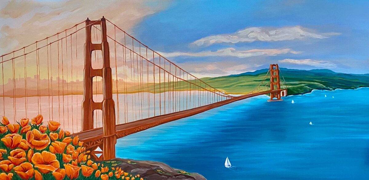 Orange California poppies bloom in front of the Golden Gate Bridge with sailboats in the bay and  San Francisco city behind it in the sunset