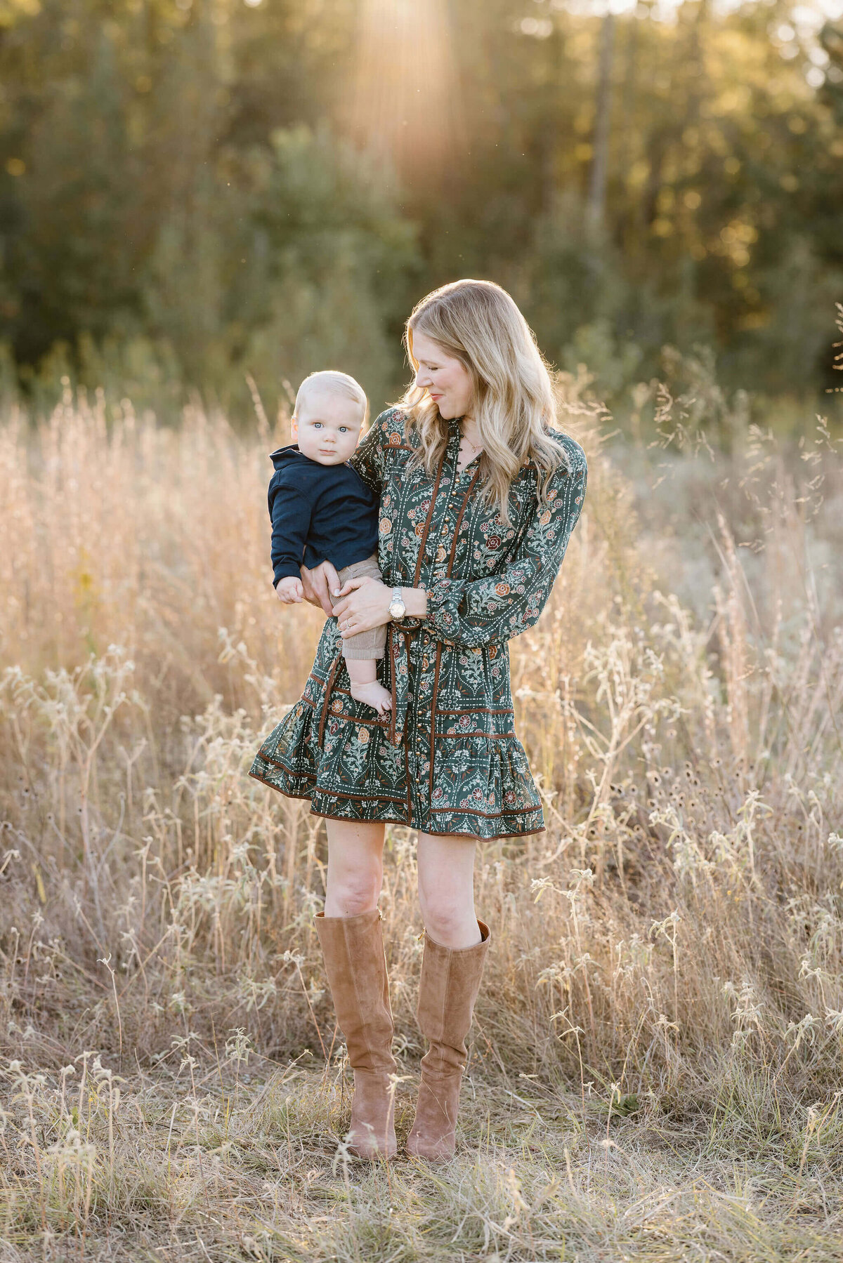 mother holding child in Longview, TX filed for family pictures