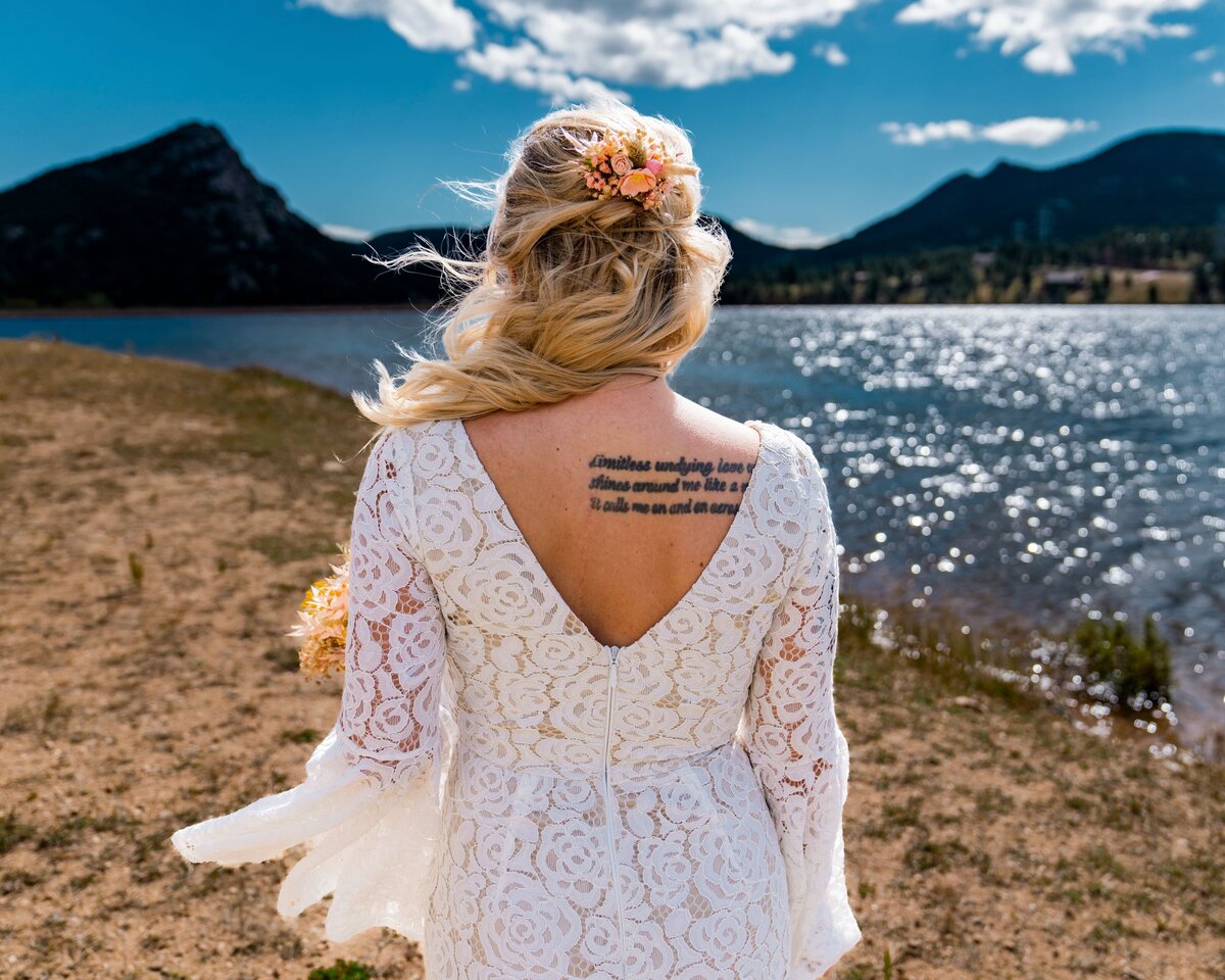 denver colorado wedding photographer - bride looking out over water