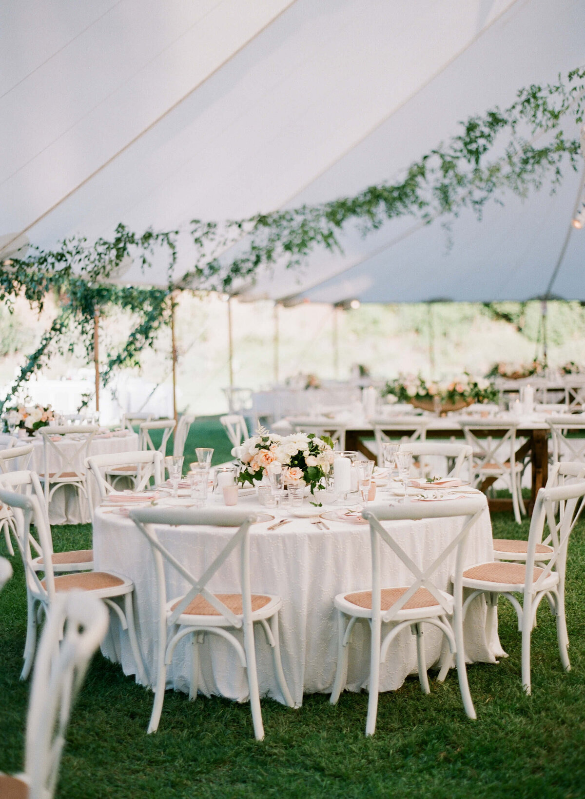 Wedding tables under custom garlands