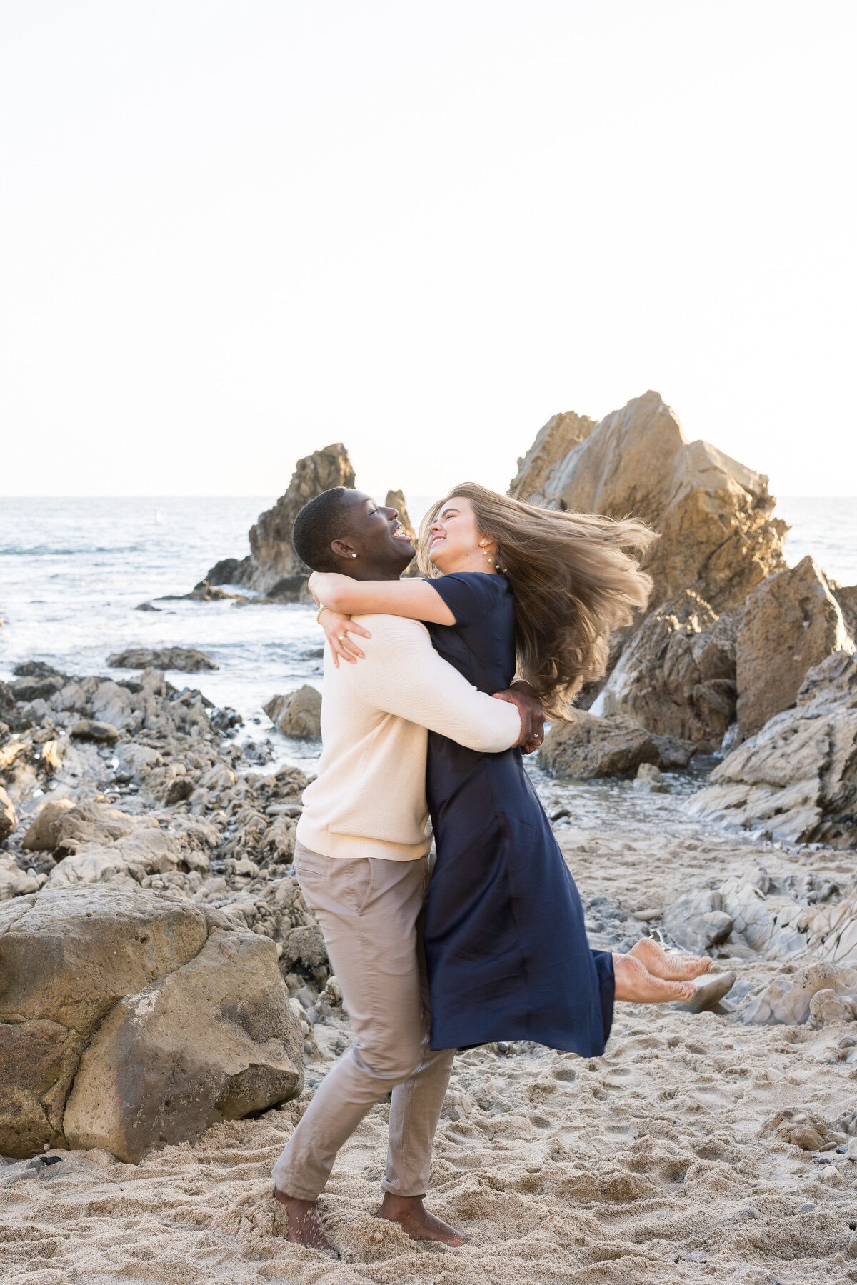 candid and fun couple photo ideas on the beach