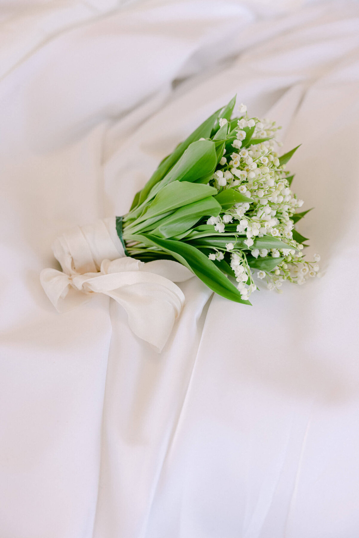 A wedding day photo of the brides bouqet of flowers at Hedsor House in the UK