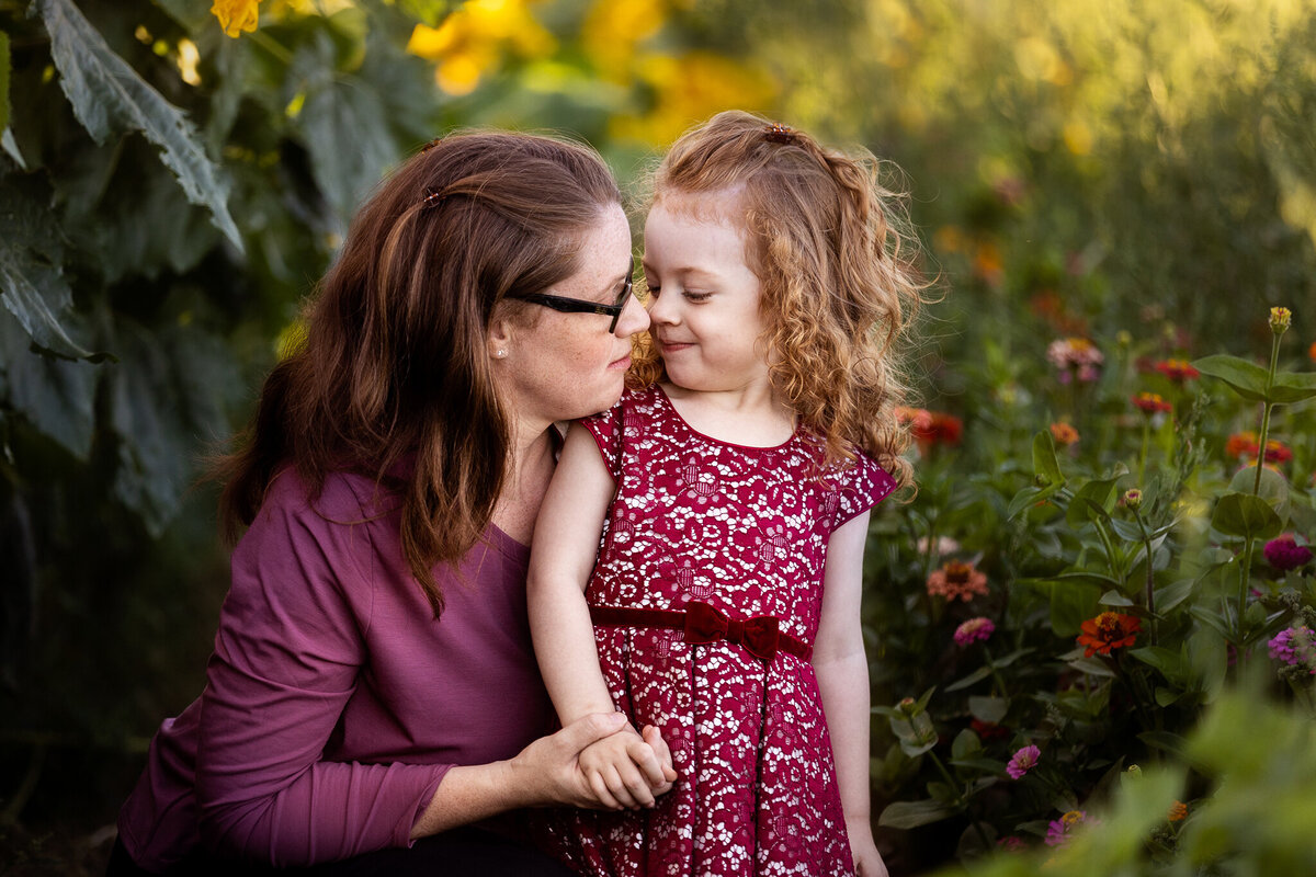 Mom with girl in flower field - Barrie Family Photography
