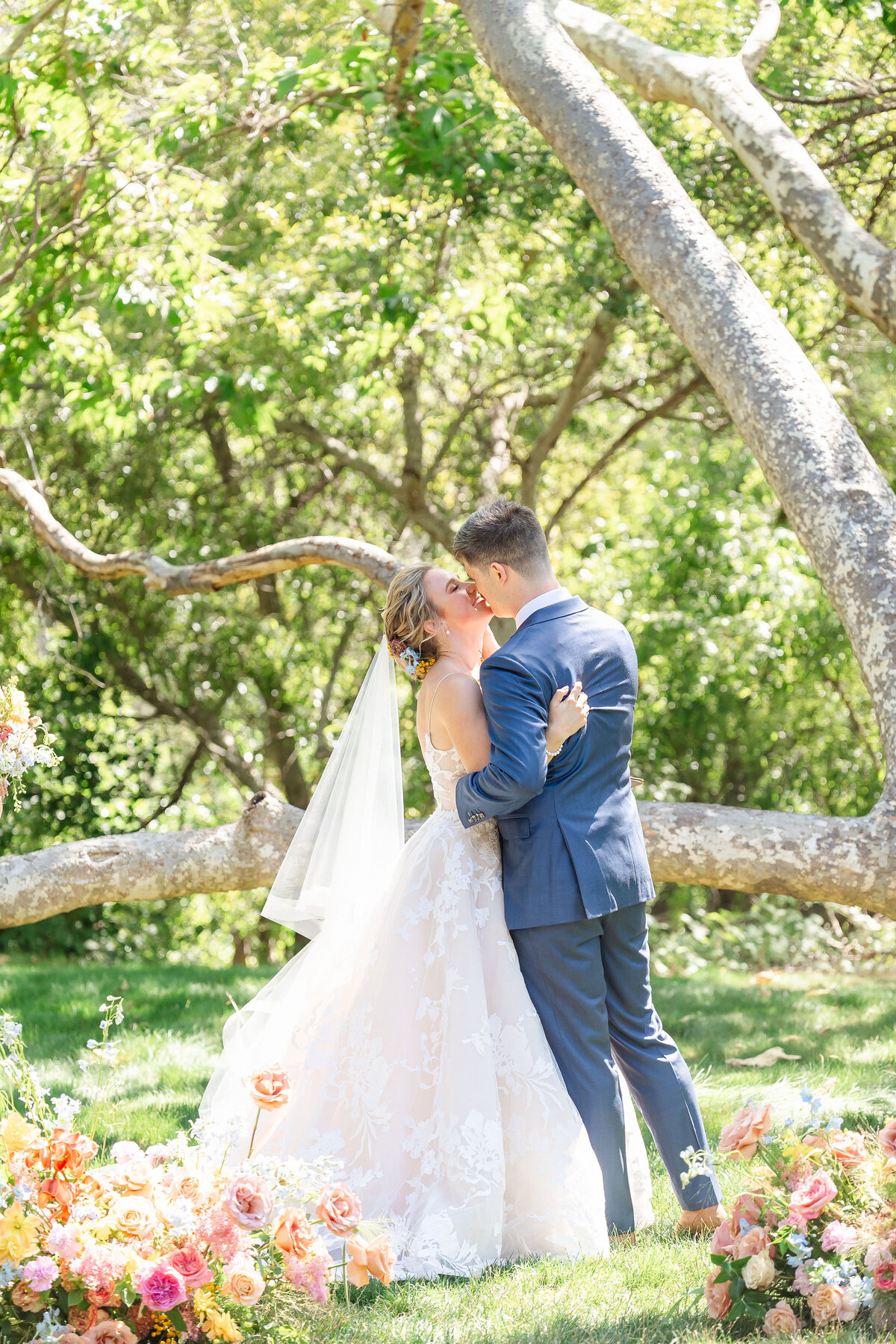 Couples beautiful moment kissing in a garden