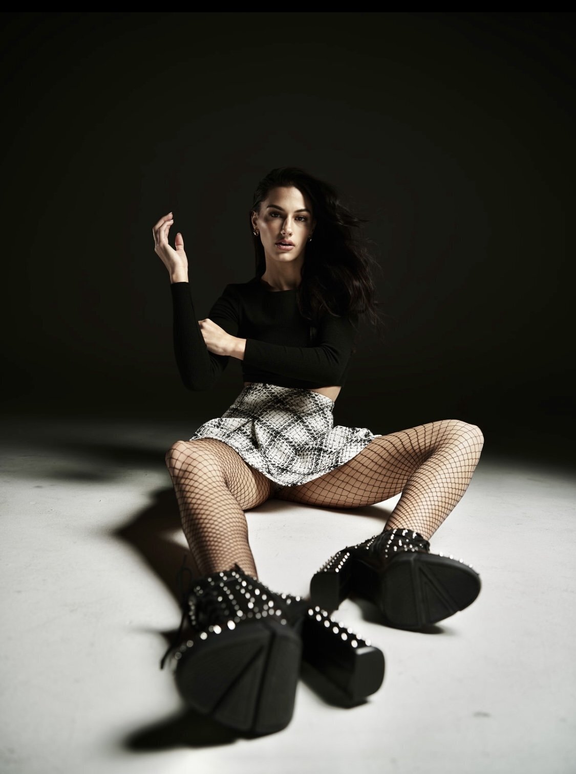Editorial-fashion-model-fishnets-plaid-boots