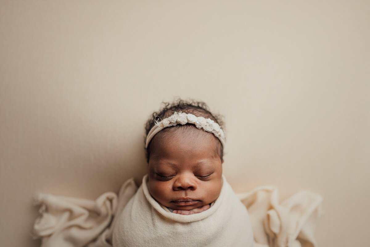 baby girl sleeping during newborn session in tampa