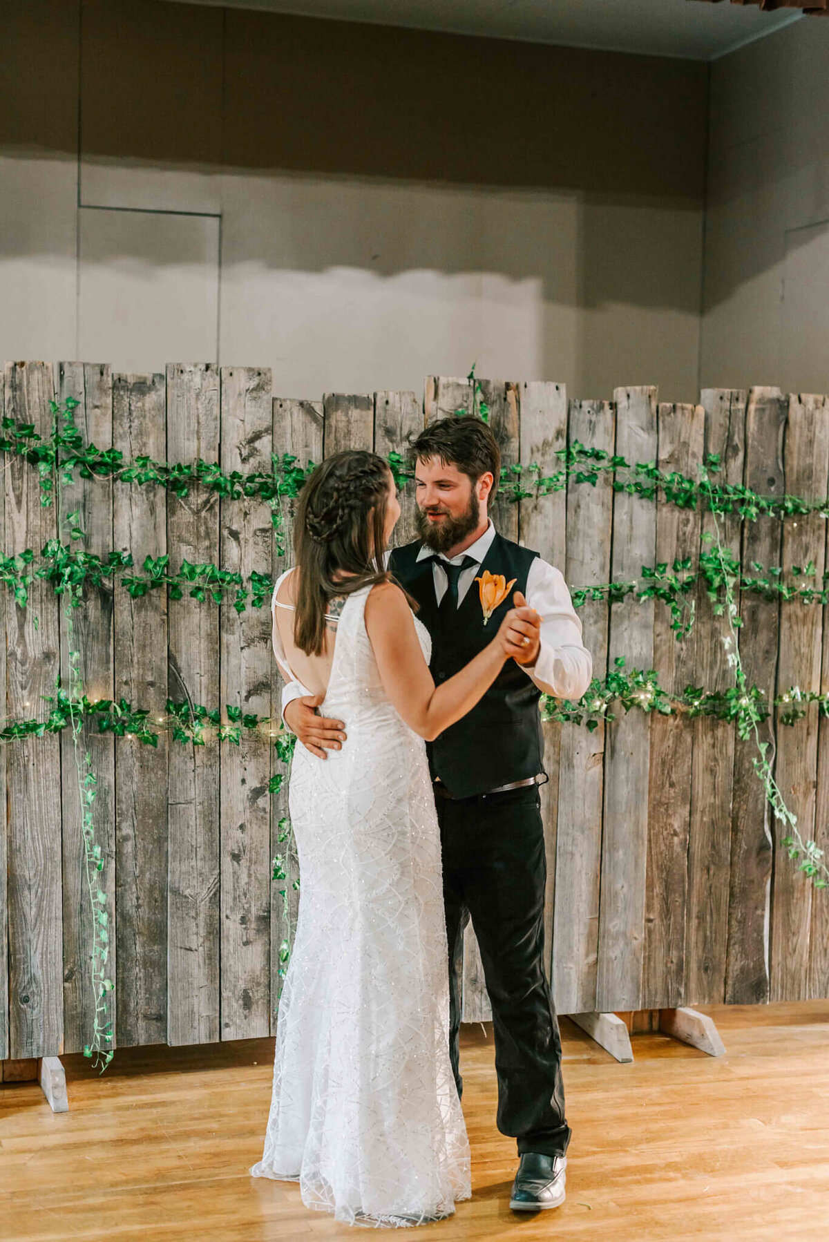 Bride and groom share their first dance.