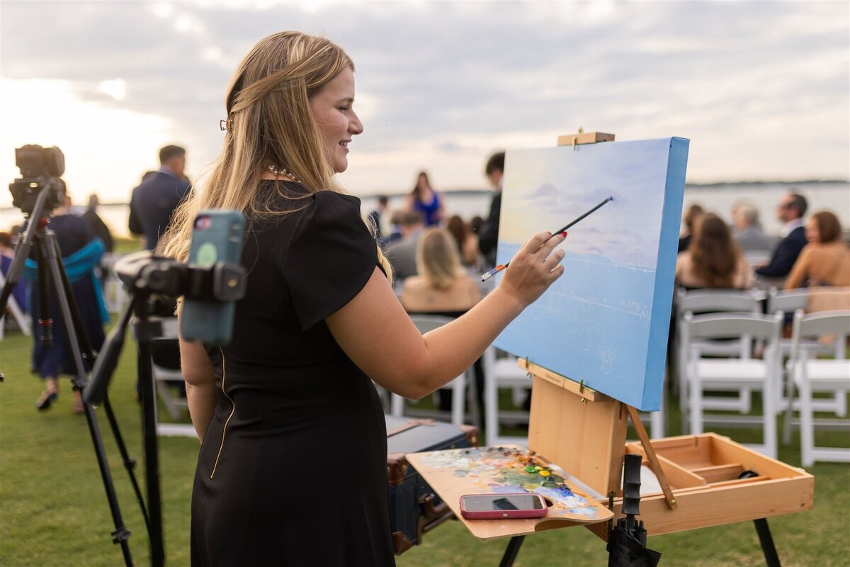 woman live painting wedding