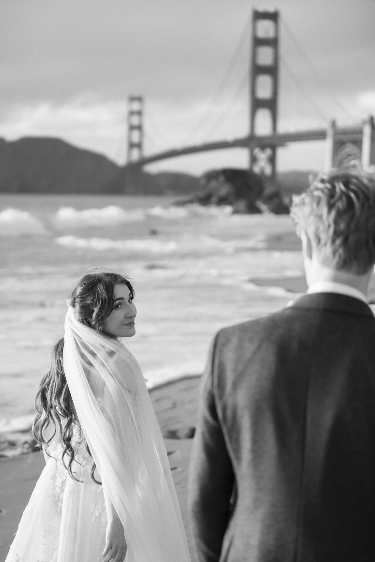 Bride and Groom at Marshall's Beach in San Francisco, California at sunset