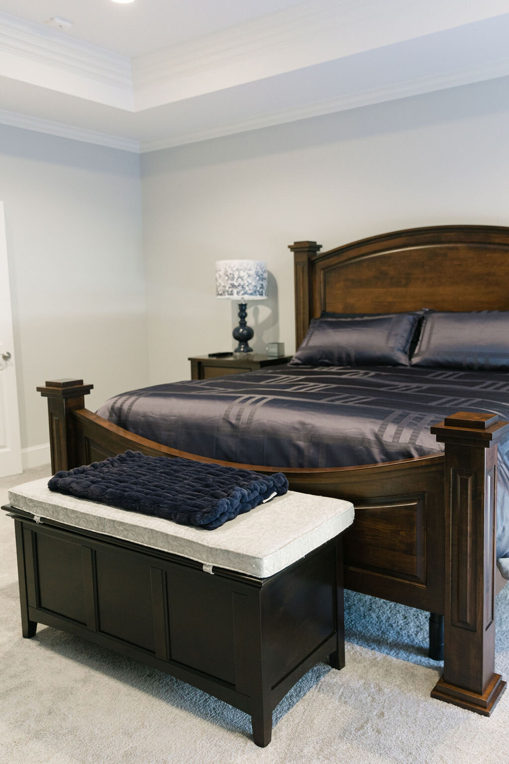 Hotel Collection navy blue comforter and navy blue lamps from Lamps Plus
