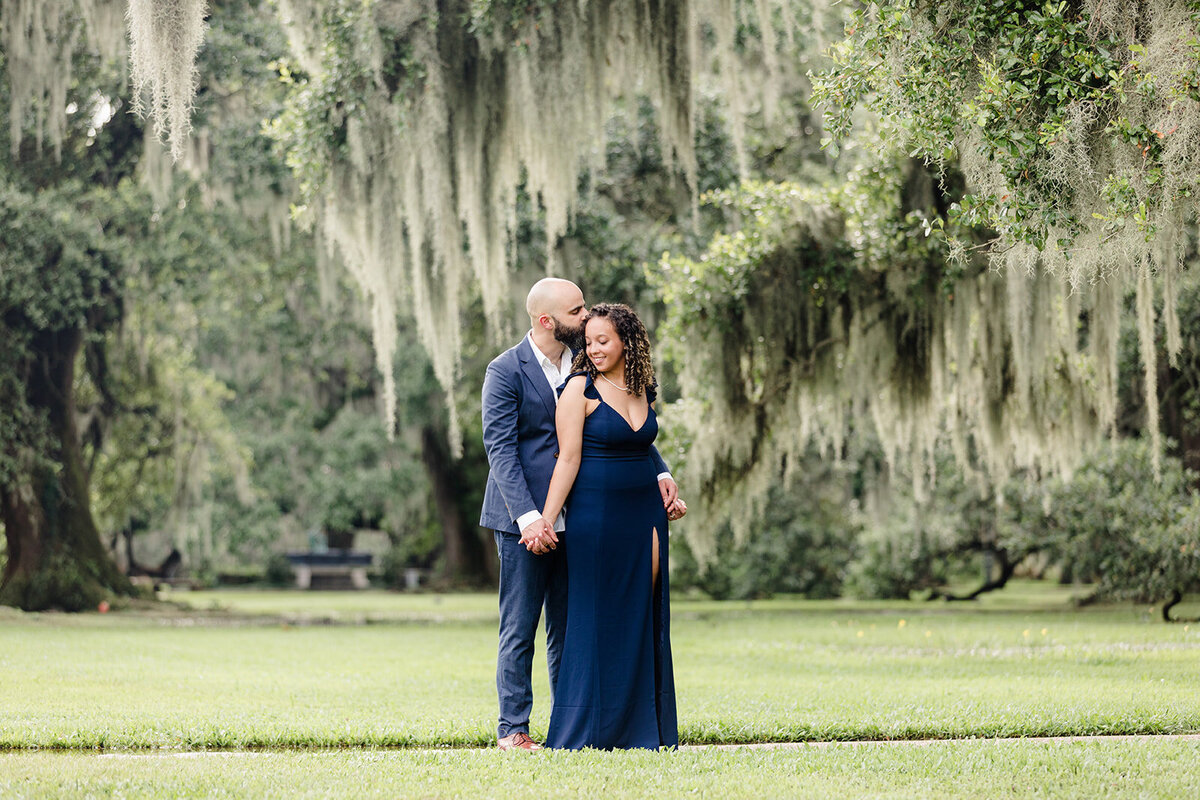 Engagement photo of couple embracing at New Orleans City Park