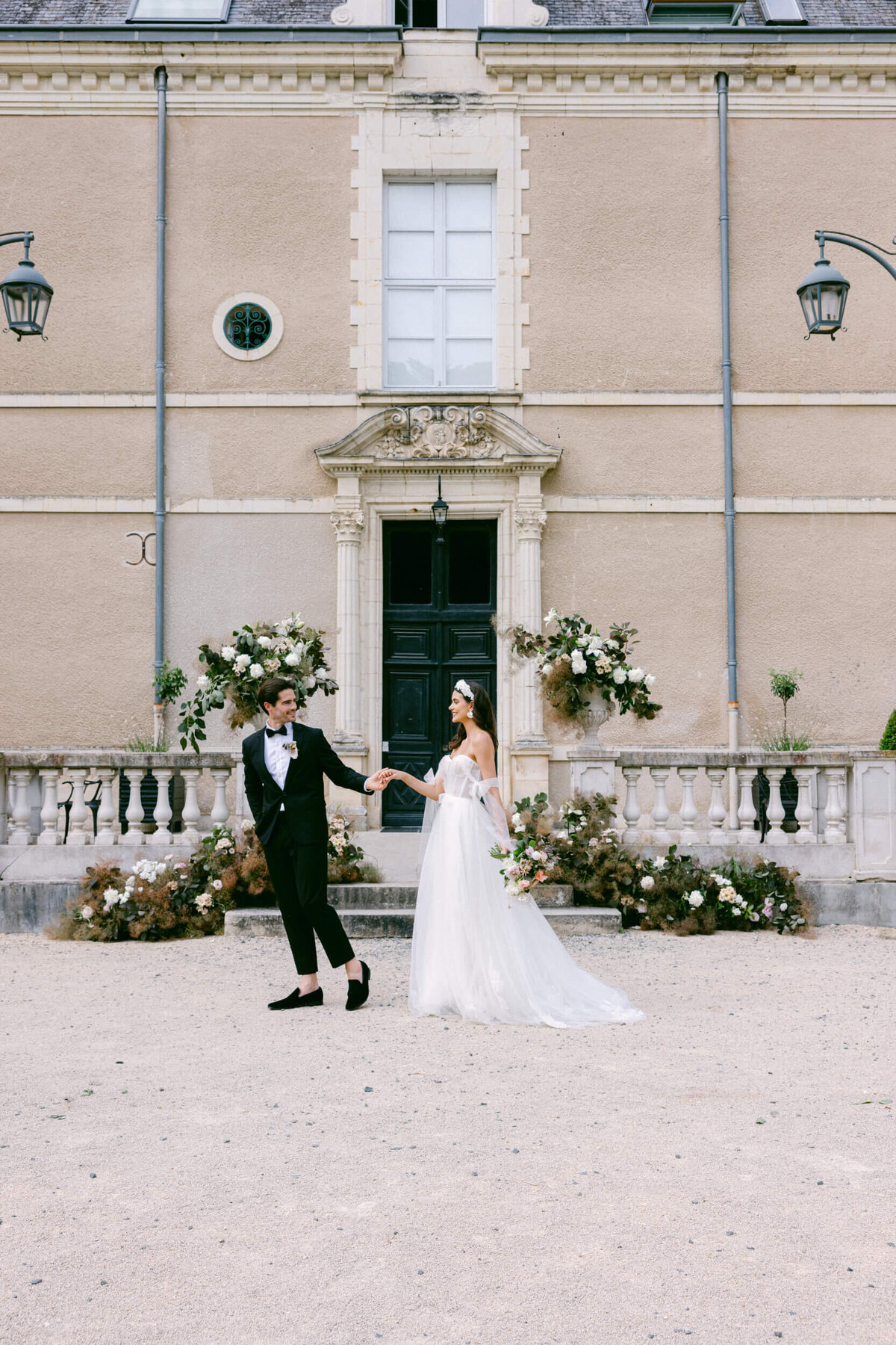A wedding day photo of the bride and groom at Chateau de Jalesnes in France