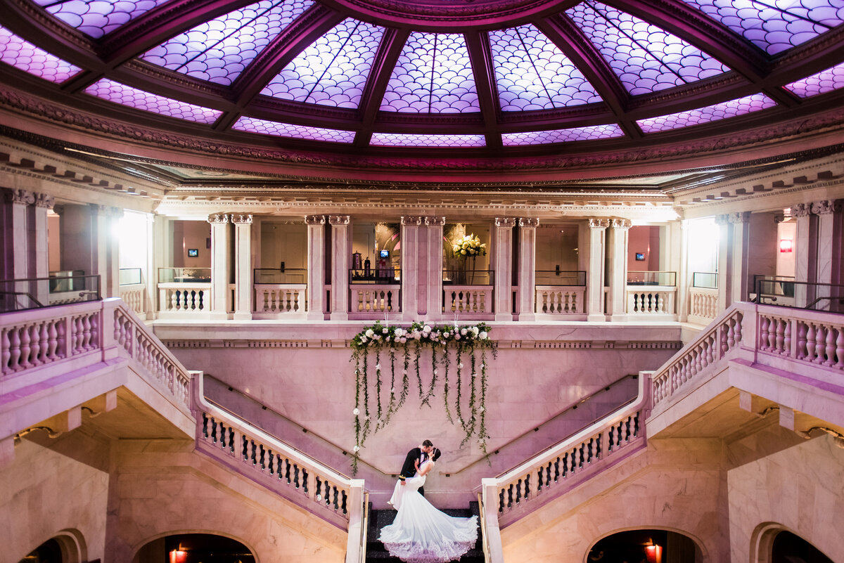 wedding picture on staircase at renaissance pittsburgh