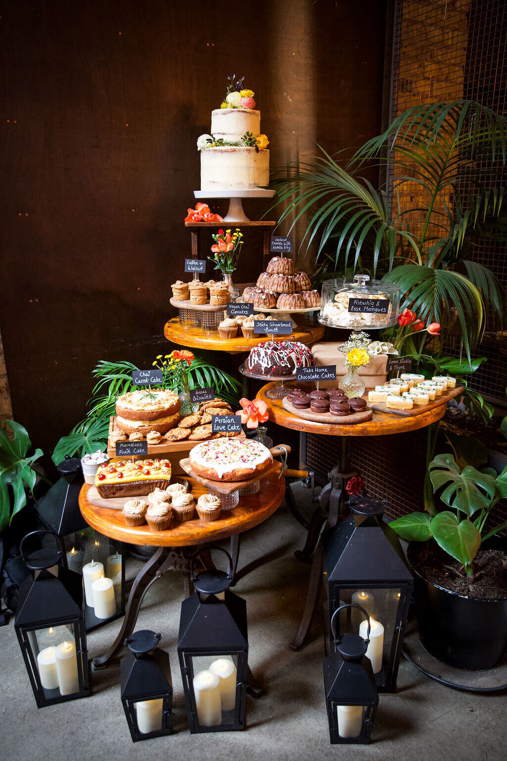 A variety of cakes at a wedding reception  on table