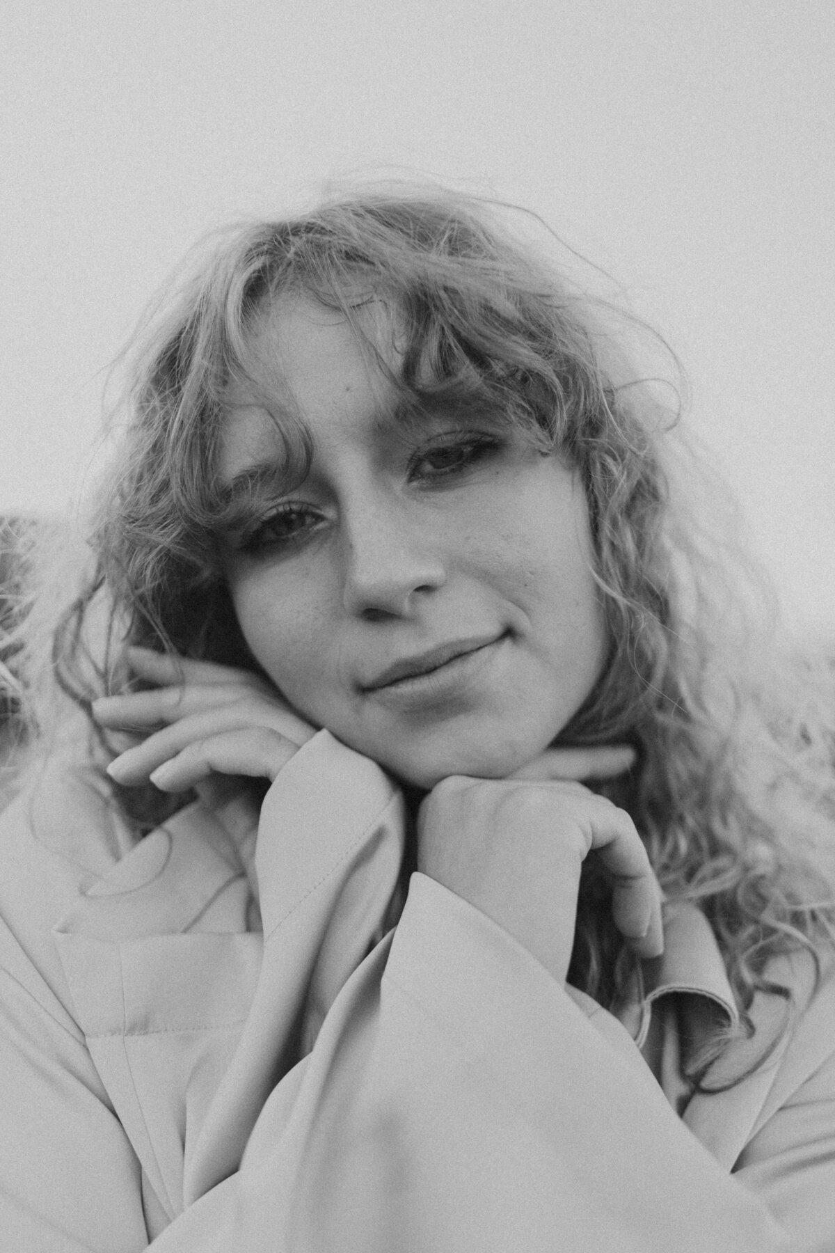 black and white image of girl posing for colorado photographer