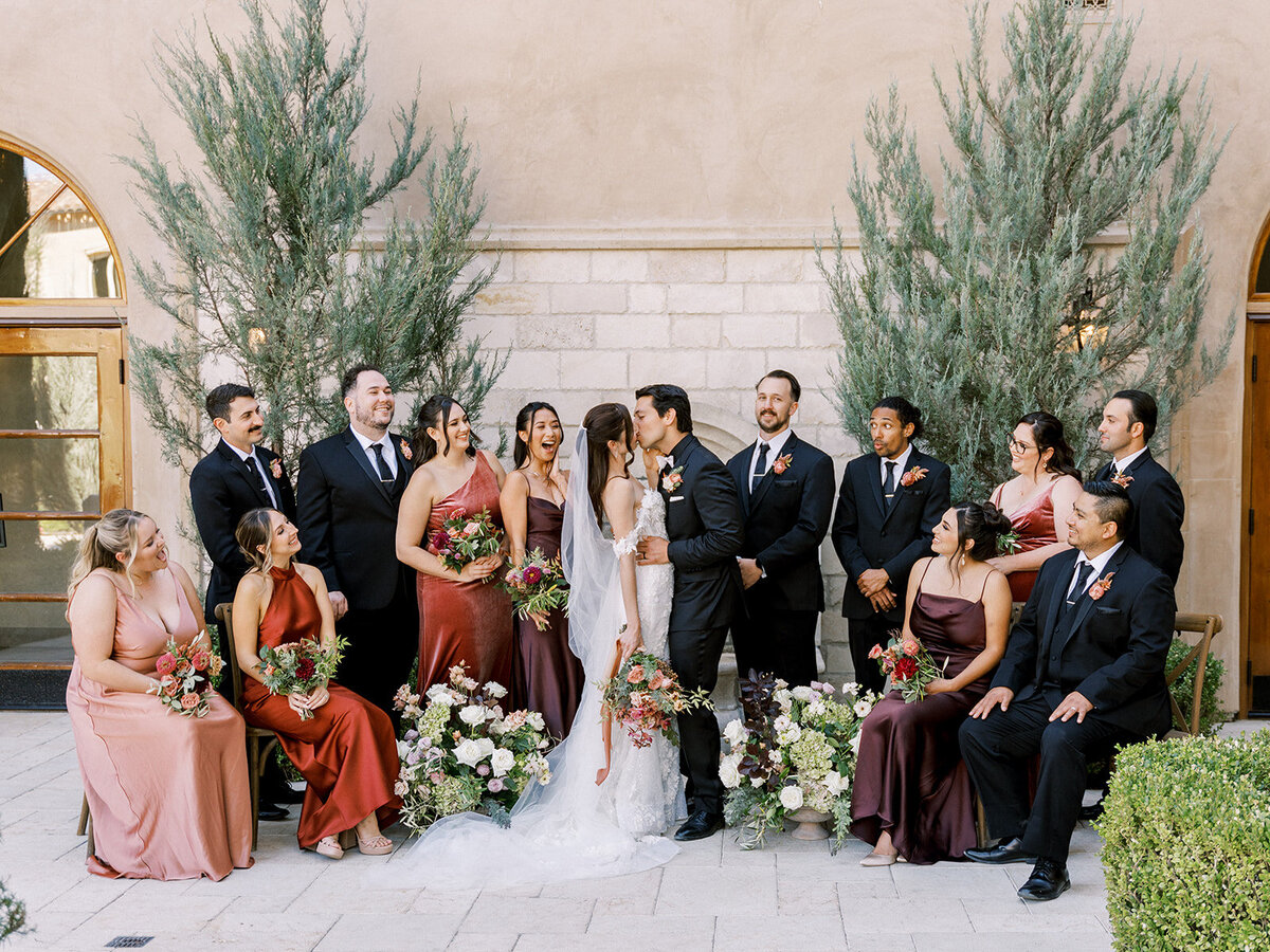 Elegant and whimsical wedding party poses for a Photo at allegretto resort