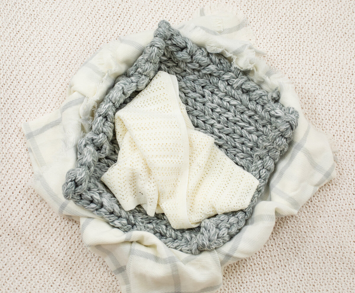 Newborn Props set-up including basket, blanket & wraps by laure photography | 09